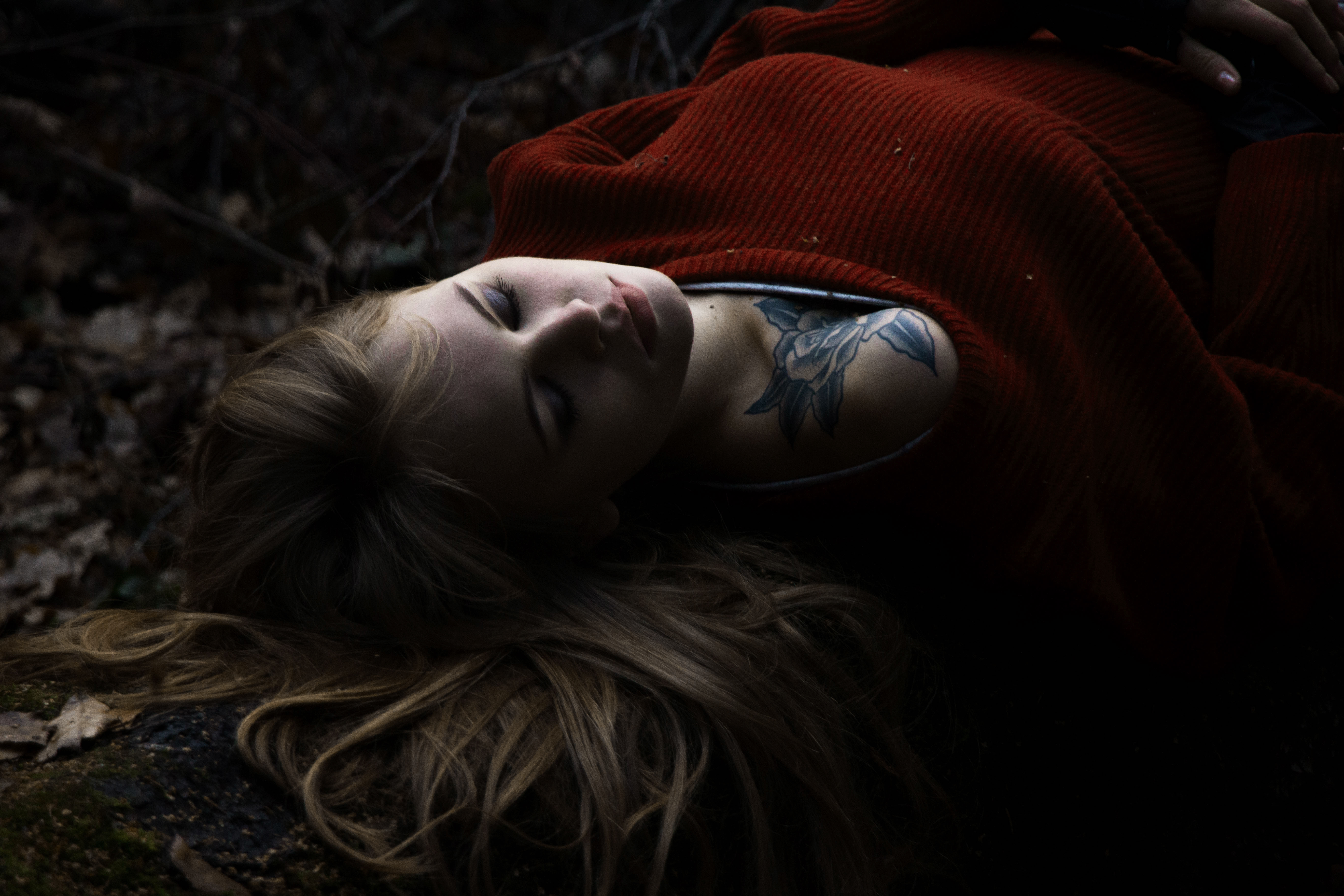 People 5472x3648 Anastasia Scheglova model women red sweater sweater lying on back Russian hair spread out makeup closed eyes