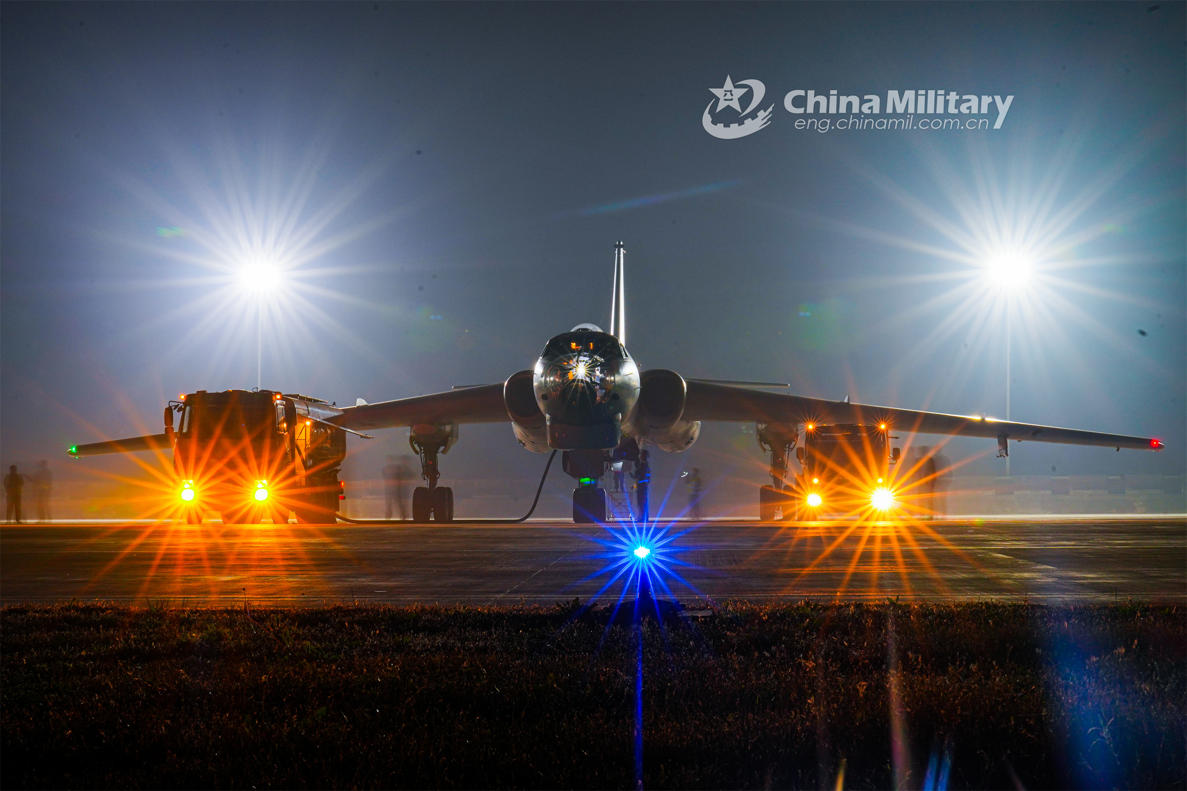 General 2400x1600 China aircraft truck Xian H-6 PLAAF military watermarked night military training Chinese aircraft lights frontal view headlights