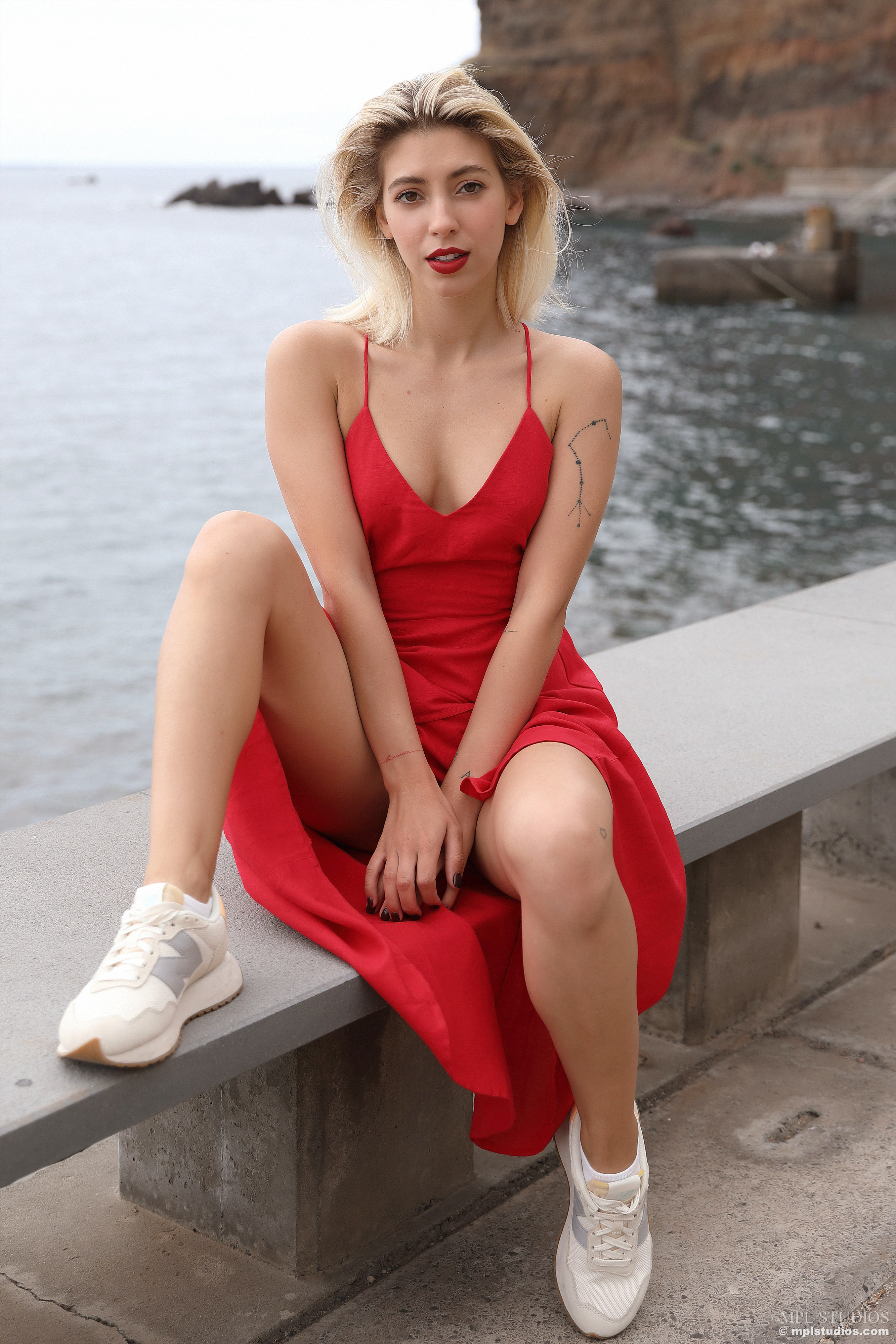 People 2667x4000 Avery MPL Studios blonde women outdoors model dress shoes looking at viewer portrait display tattoo bare shoulders sitting strategic covering red lipstick women sneakers New Balance watermarked Ukrainian
