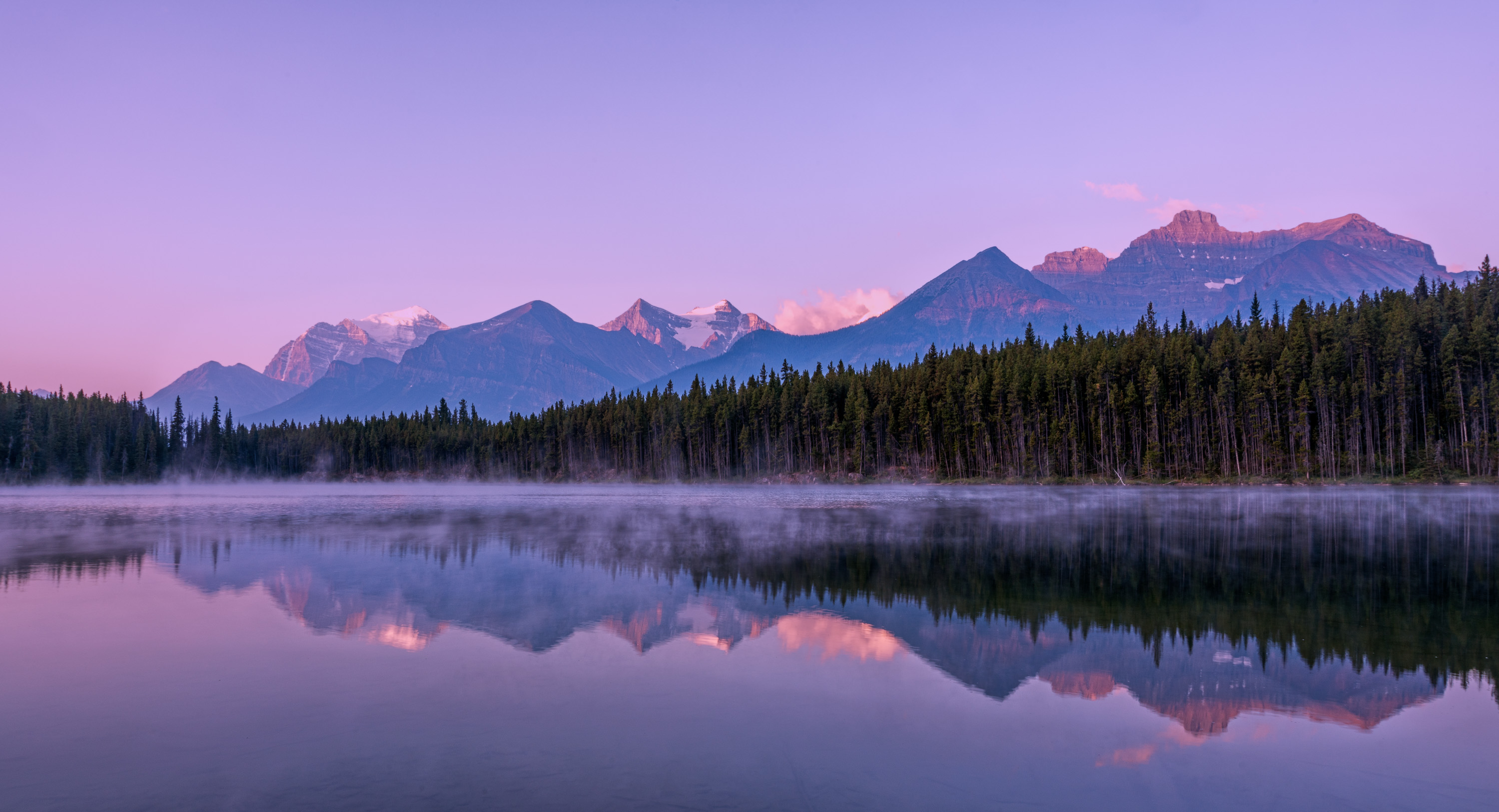 General 3000x1626 nature landscape trees forest water lake reflection clouds sky mountains snowy peak mist Herbert Lake Alberta Canada