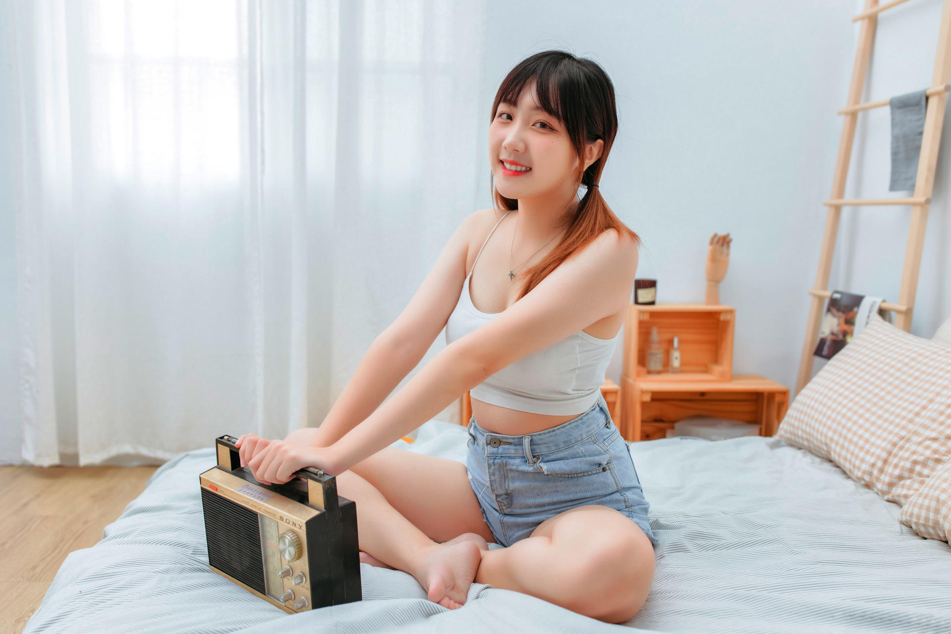 People 1920x1280 Asian model women women indoors dark hair long hair sitting bed necklace curtains crate pillow white tops jean shorts depth of field legs crossed dyed hair twintails radio ladder barefoot