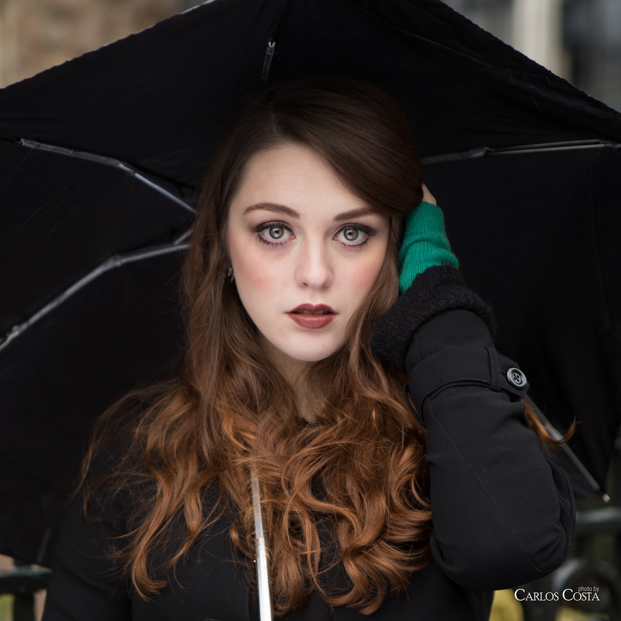 People 1280x1280 Imogen Dyer women brunette black coat women with umbrella one arm up pale looking at viewer umbrella long hair red lipstick model face women outdoors urban Carlos Costa