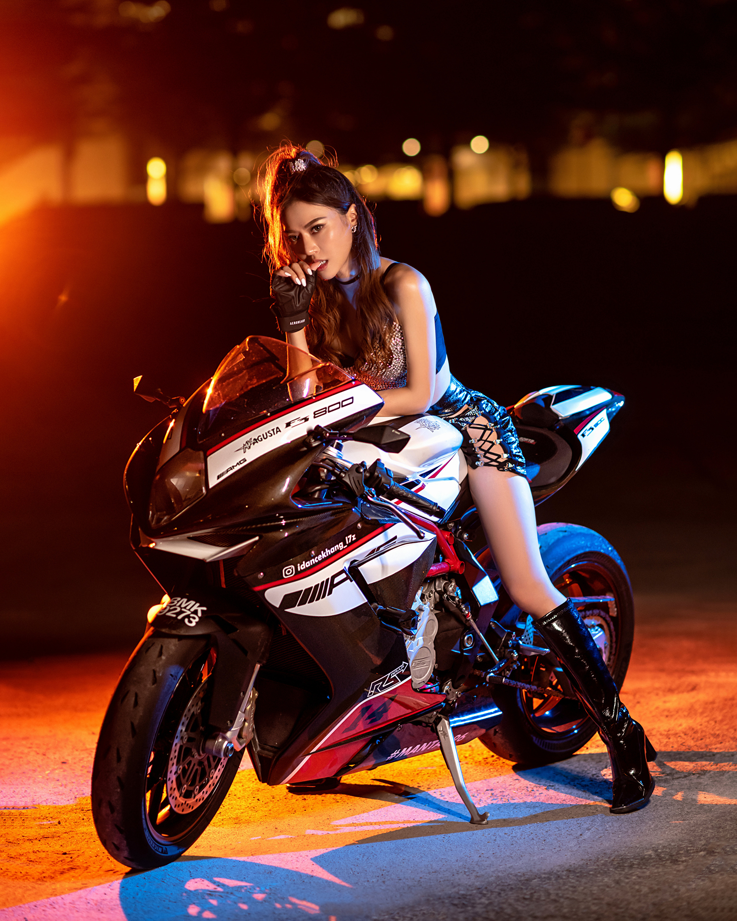 People 2560x3200 Asian model women long hair dark hair motorcycle sitting women with motorcycles legs boots leather boots long boots bare midriff night finger on lips looking at viewer MV agusta Italian motorcycles