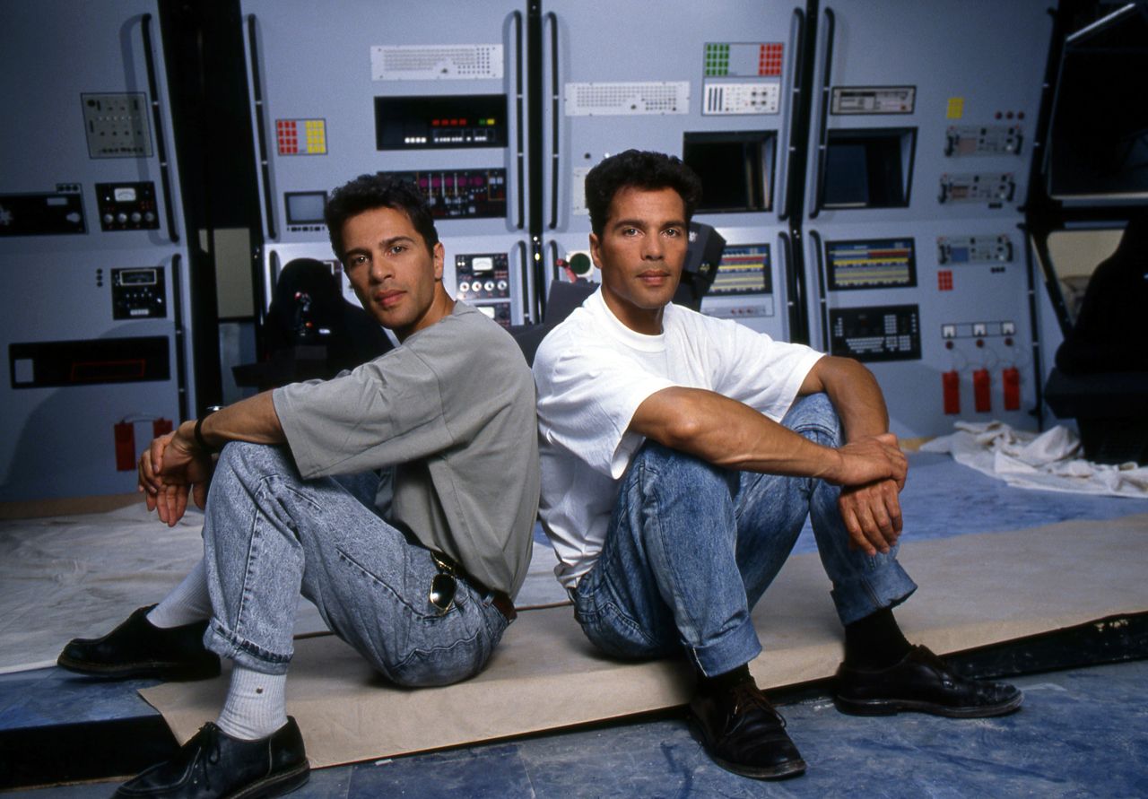 People 1280x891 Igor Bogdanoff Grichka Bogdanoff twins sitting looking at viewer brothers jeans white shirt shirt socks shoes short sleeves men deceased French