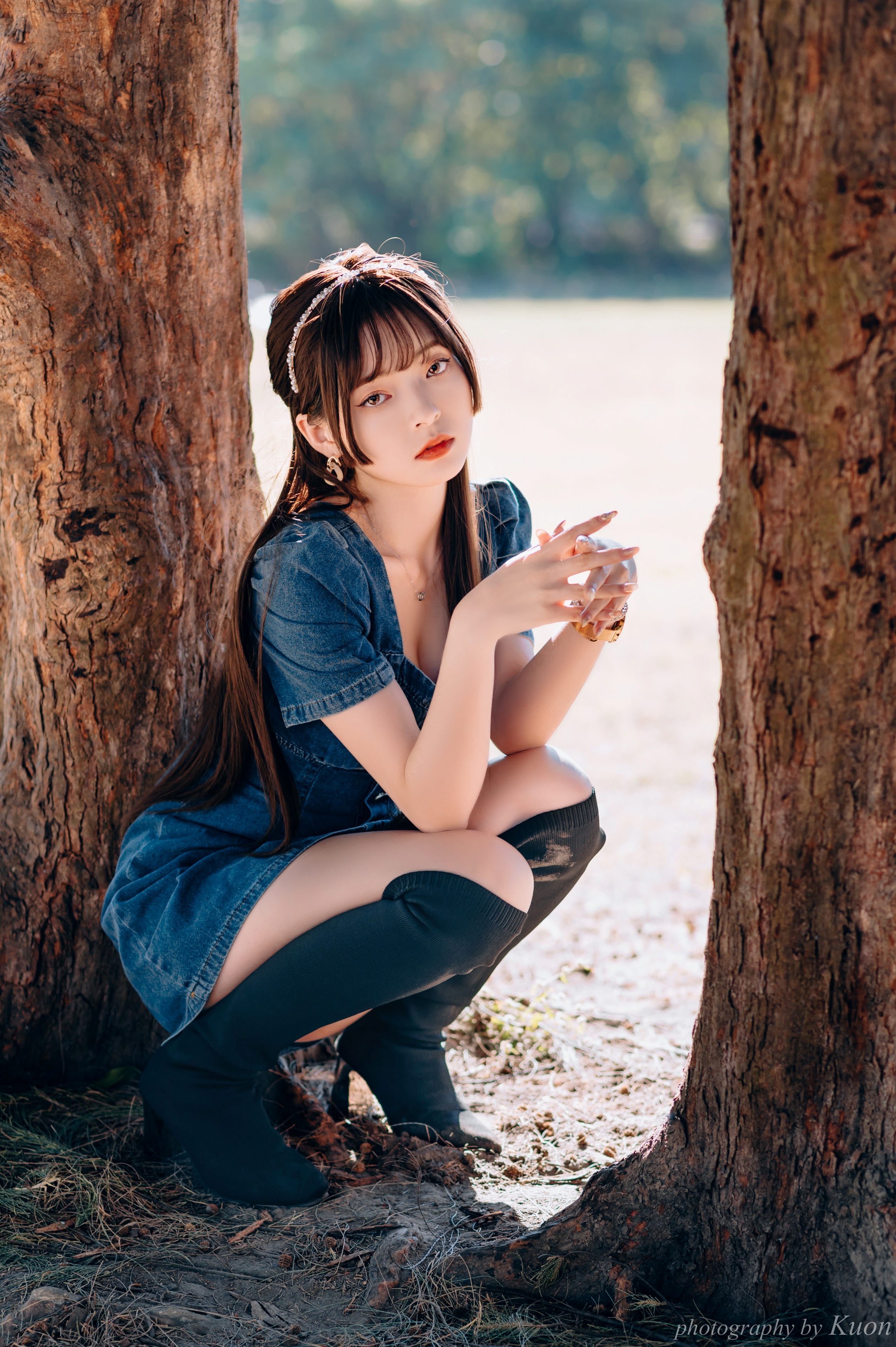 People 2555x3840 Asian women model brunette bangs long hair looking at viewer parted lips portrait display necklace dress denim boots depth of field trees cleavage outdoors women outdoors Chinese knee-high boots Chinese model red lipstick
