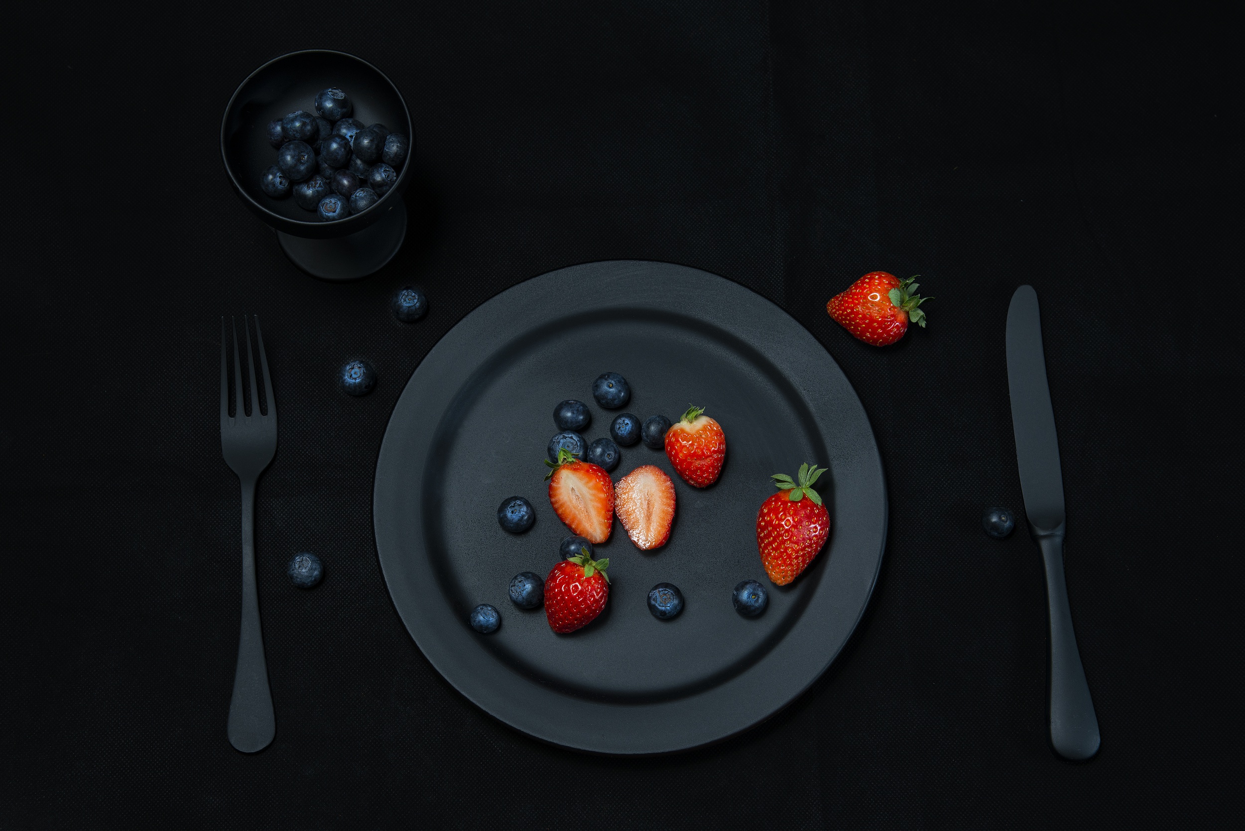 General 2500x1669 food strawberries fork knife fruit berries blueberries knife and fork black black background