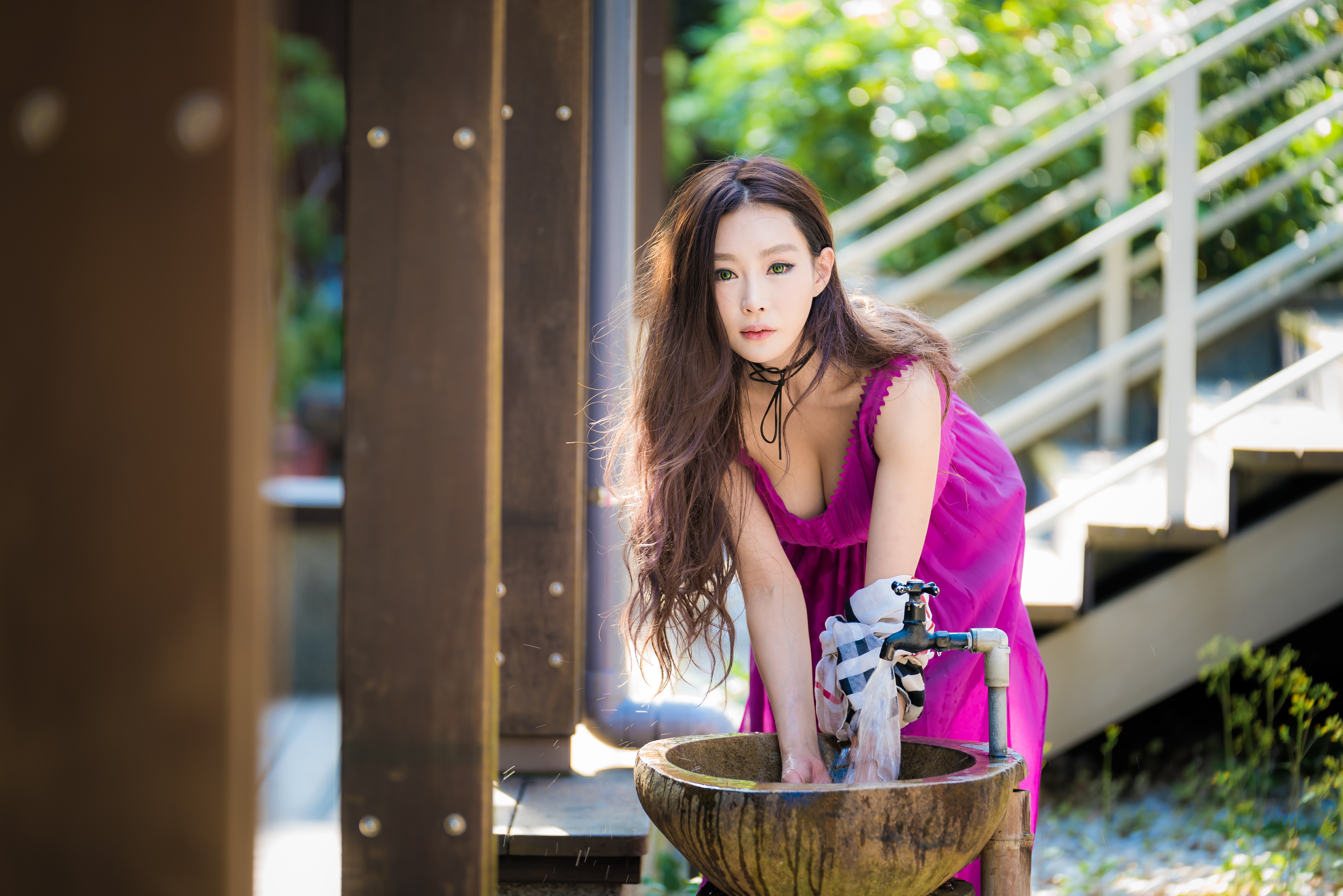 People 4500x3002 Asian model long hair depth of field brunette stairs fountain green eyes looking at viewer washing purple dress bushes column cleavage women