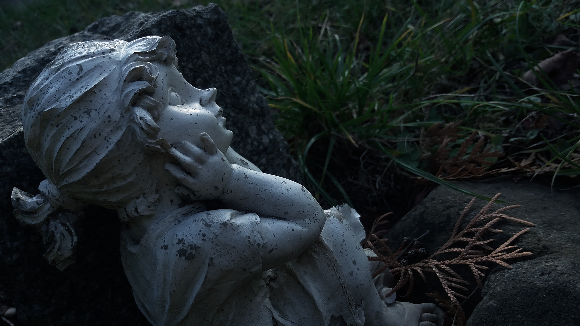 General 1920x1080 grass stones statue face dark touching face abandoned