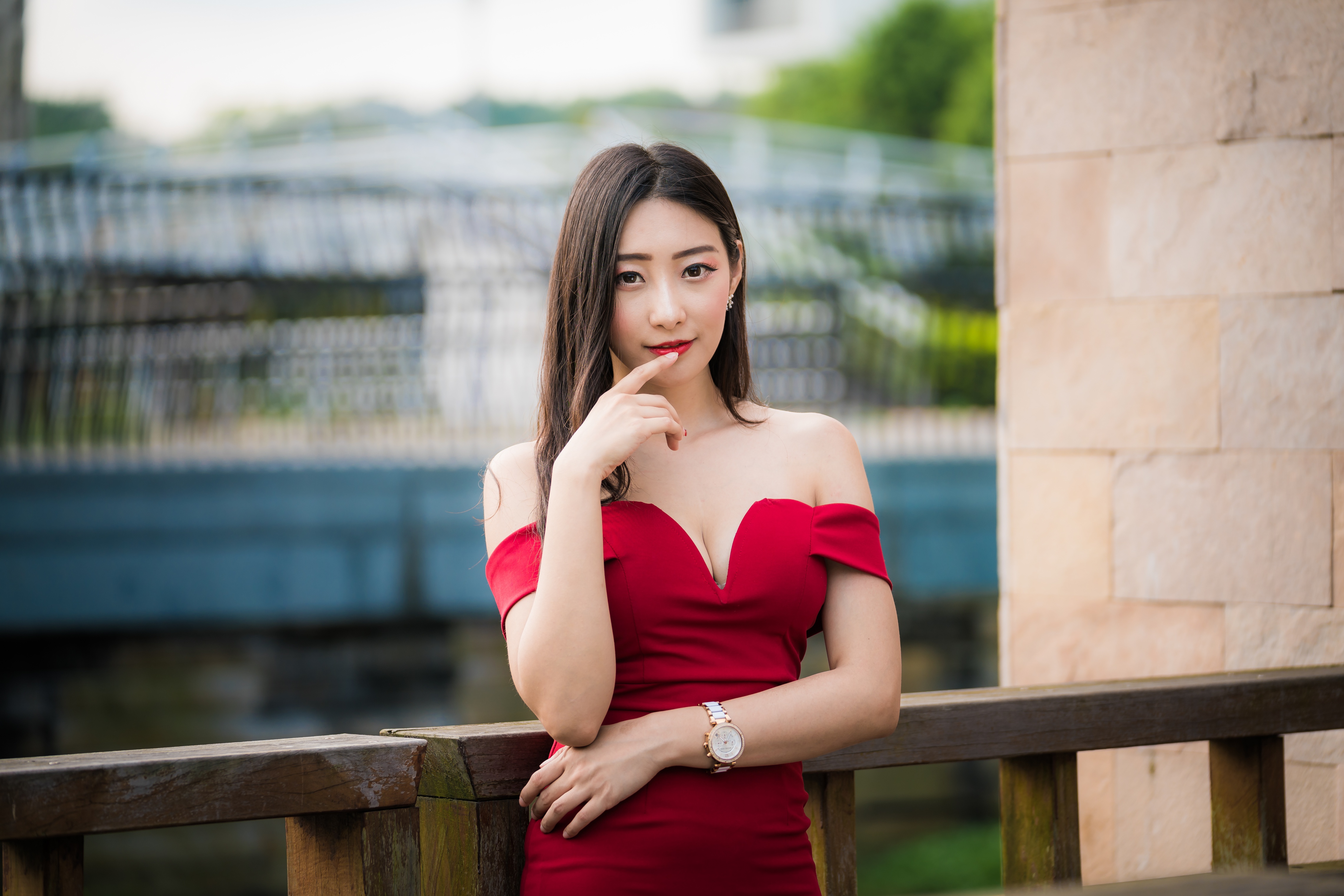 People 4562x3043 Asian women model railing red dress depth of field red lipstick long hair brunette wristwatch earring fence stone wall
