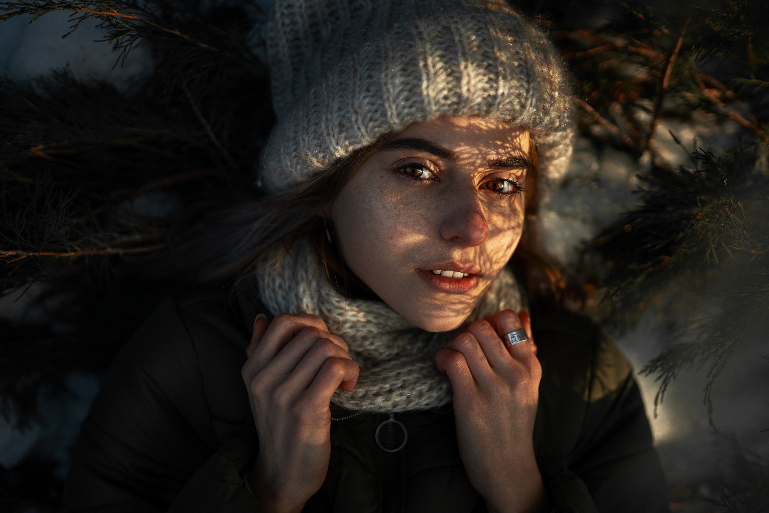 People 2560x1708 women model portrait looking at viewer top view closeup brown eyes freckles woolly hat scarf jacket hands snow bokeh winter lying on back outdoors women outdoors face Maxim Gustarev wool cap