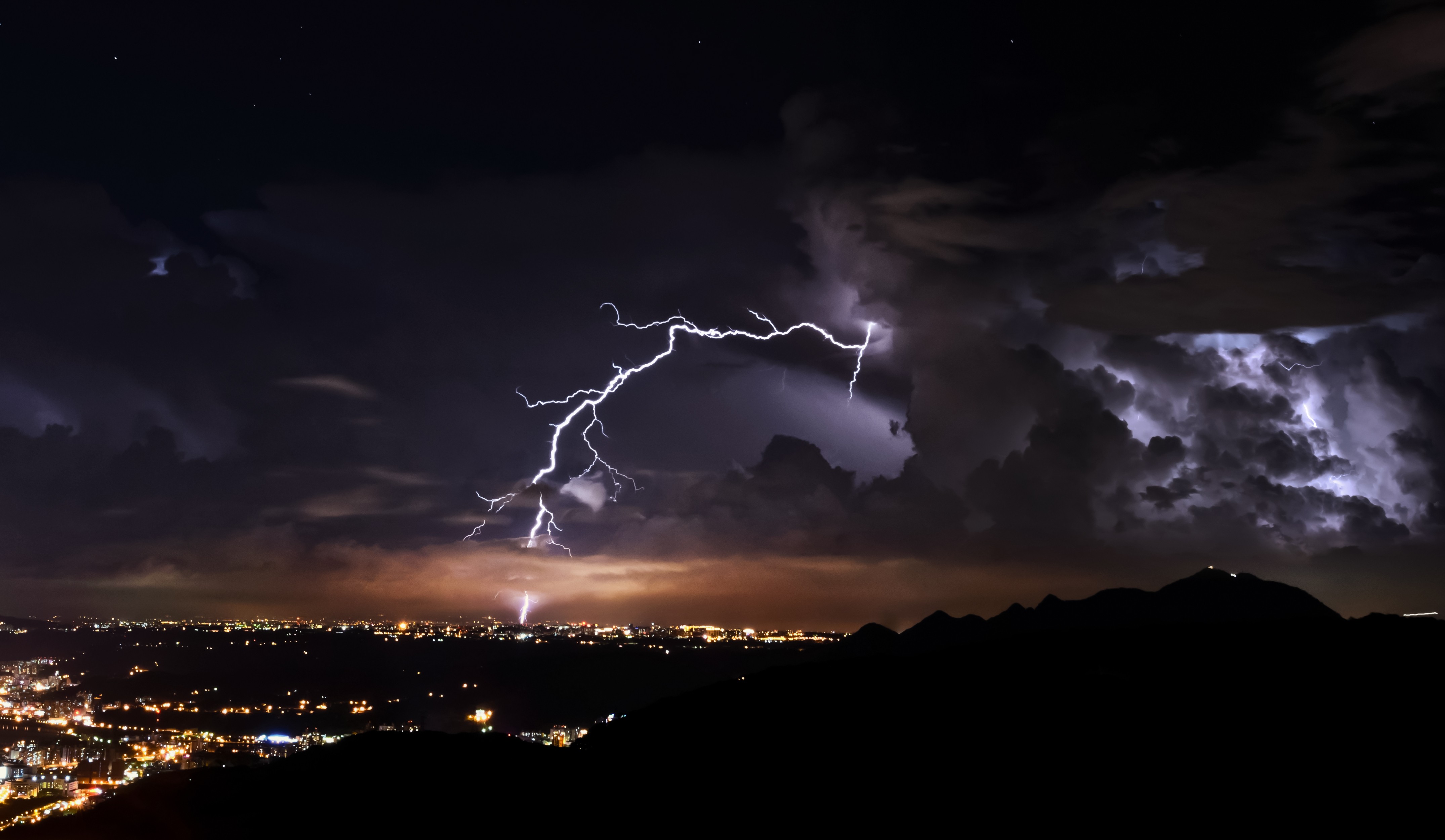 General 4300x2500 nature landscape clouds lightning night storm cityscape city lights mountains silhouette
