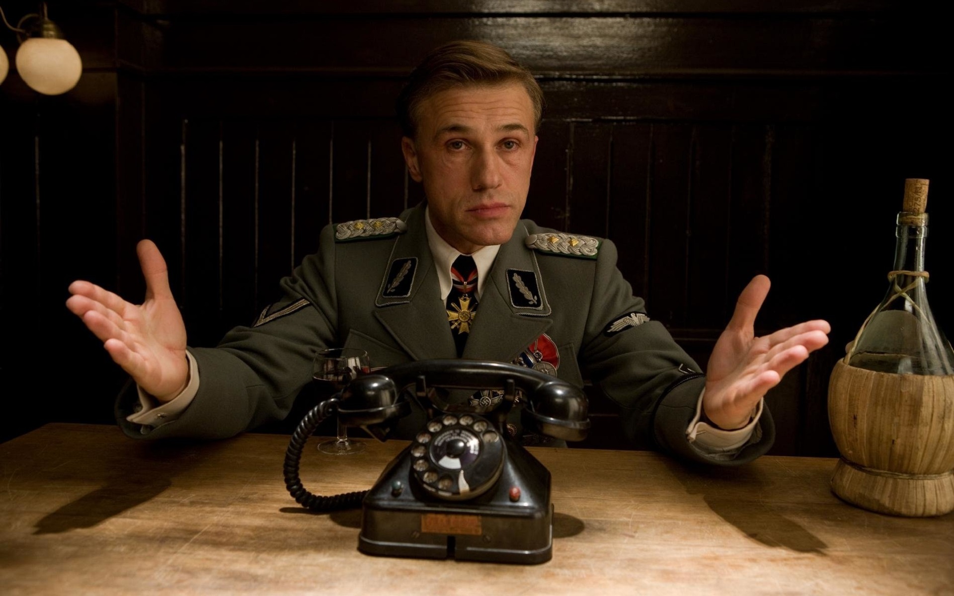 People 1920x1200 Christoph Waltz movies men uniform phone Nazi Inglourious Basterds film stills actor bottles
