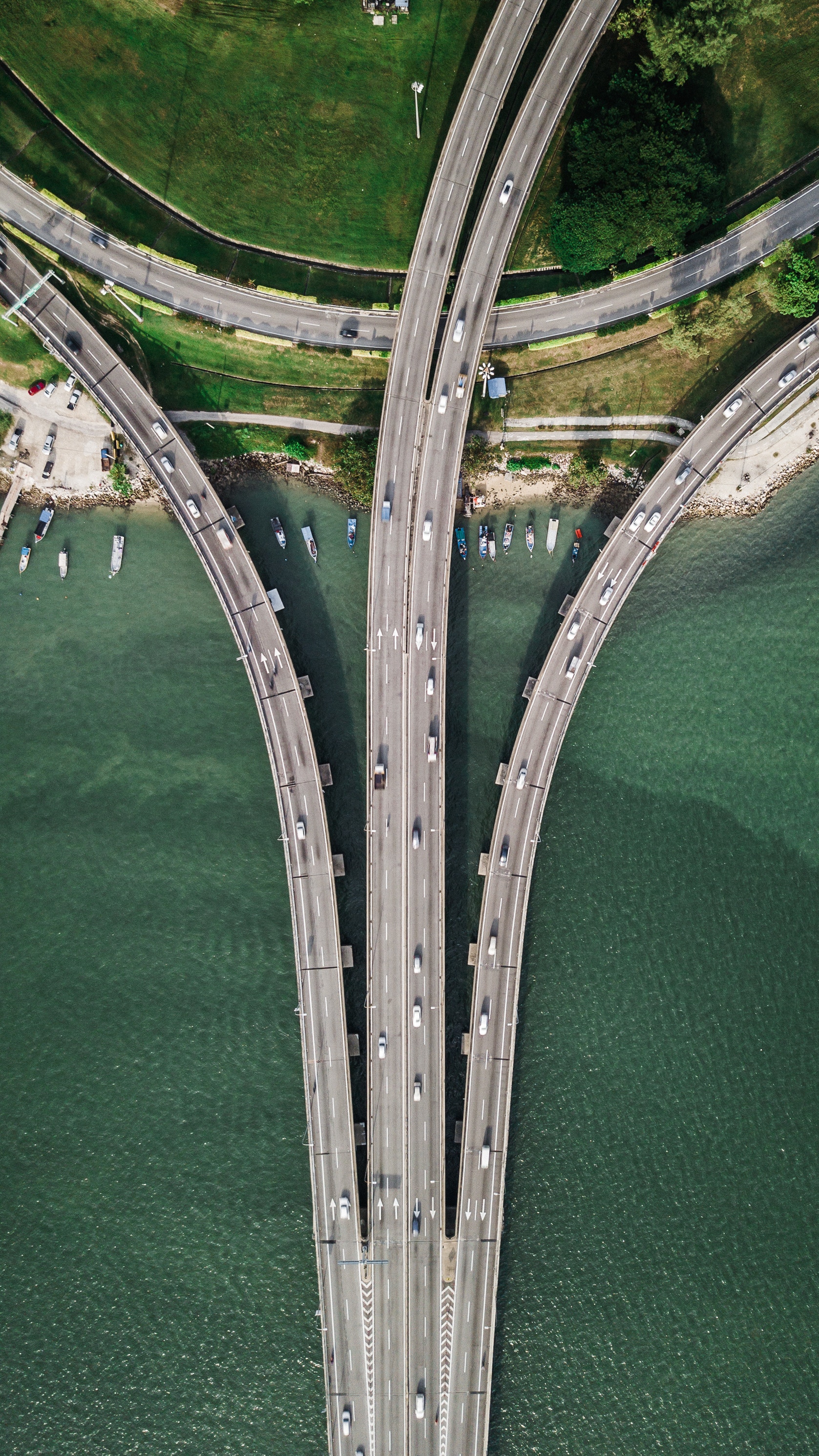 General 1677x2981 drone photo road bridge car boat grass trees water sea top view Freeway intersections aerial view