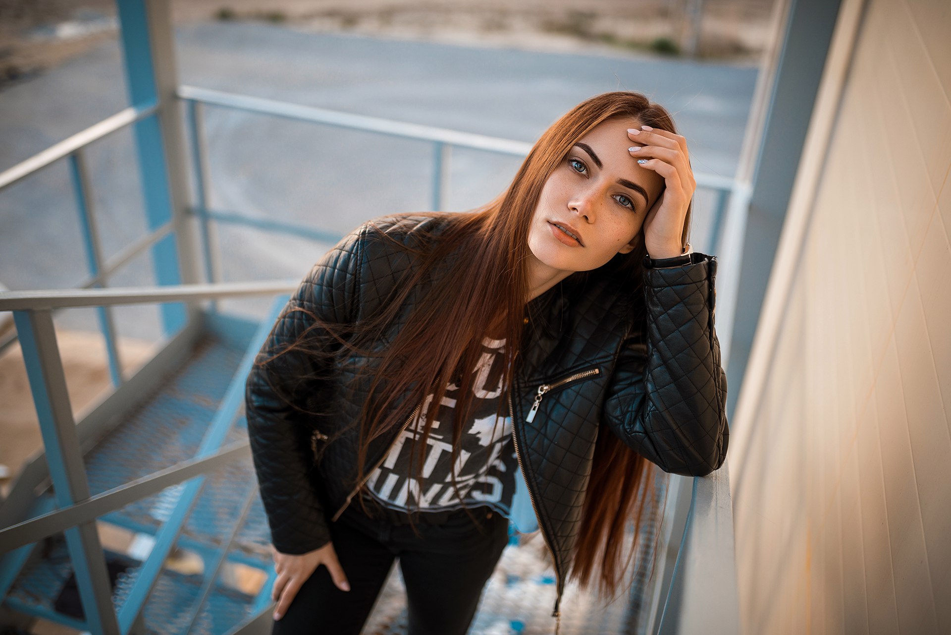 People 1920x1281 women portrait leather jacket women outdoors depth of field black clothing stairs straight hair long hair hand(s) on head