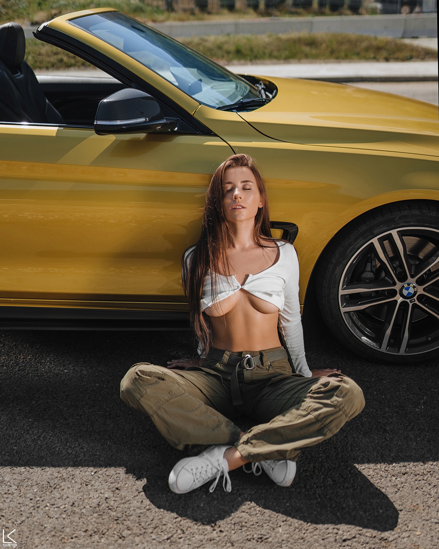 People 1536x1920 women car BMW underboob Arilaviee women with cars vehicle closed mouth parted lips Sergey Freyer sneakers brunette German cars white clothing yellow pants collarbone outdoors women outdoors relaxing on the ground bent legs sunlight side view bare midriff