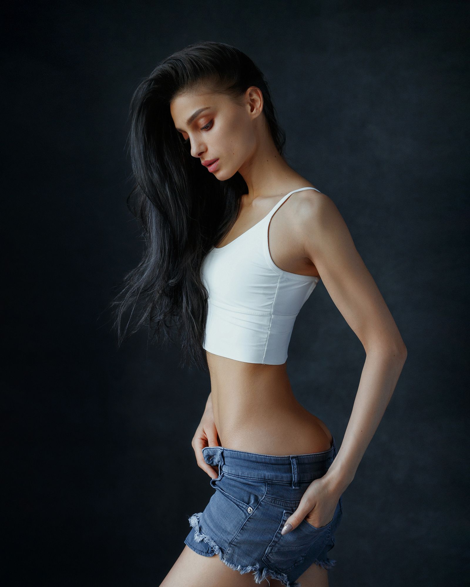 People 1600x2000 model side view tank top shorts low waist jeans portrait display low light simple background