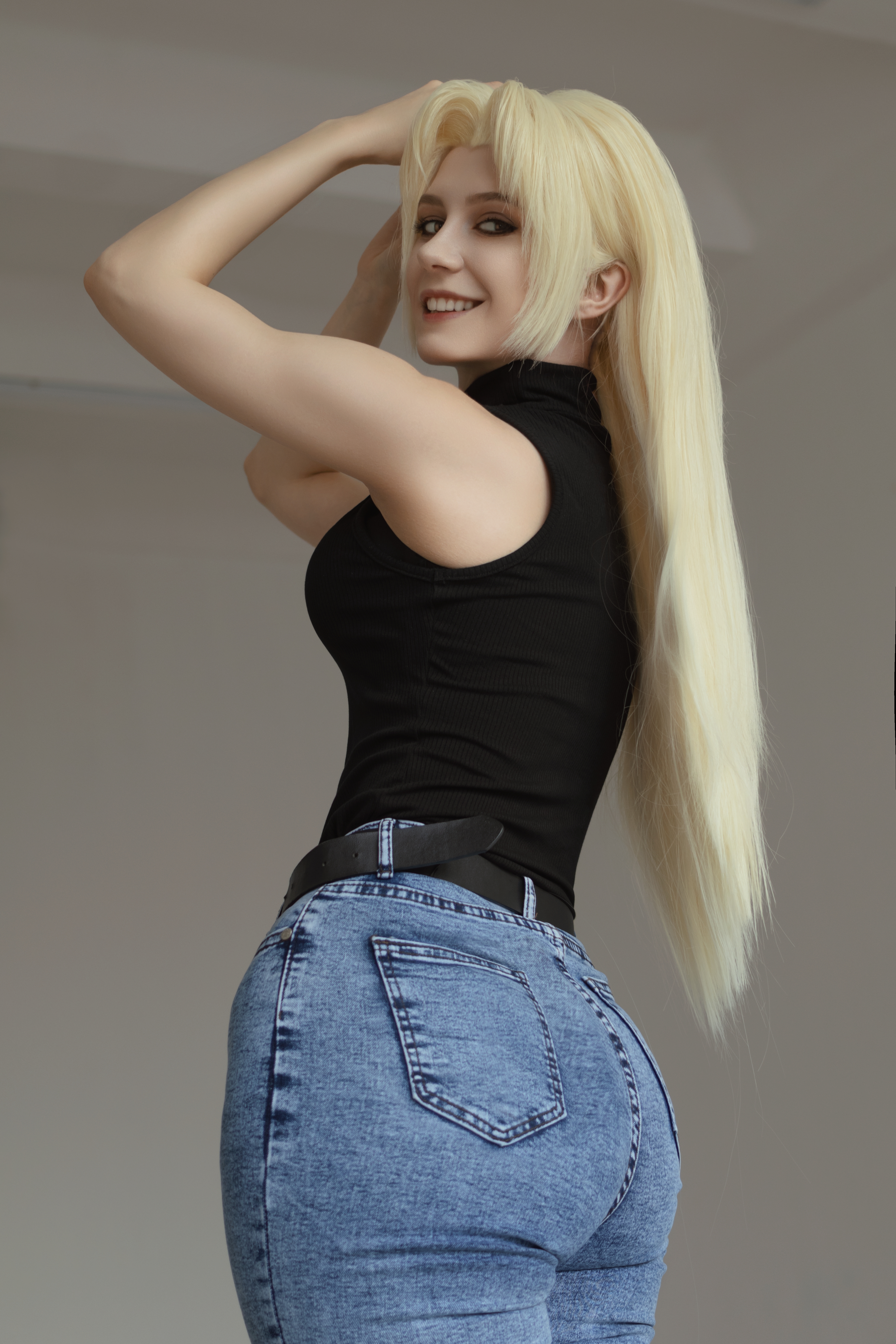 People 4000x6000 thighs MiakanaYuri jeans blonde ass looking over shoulder teeth looking at viewer smiling portrait display long hair arms up standing simple background belt women model women indoors