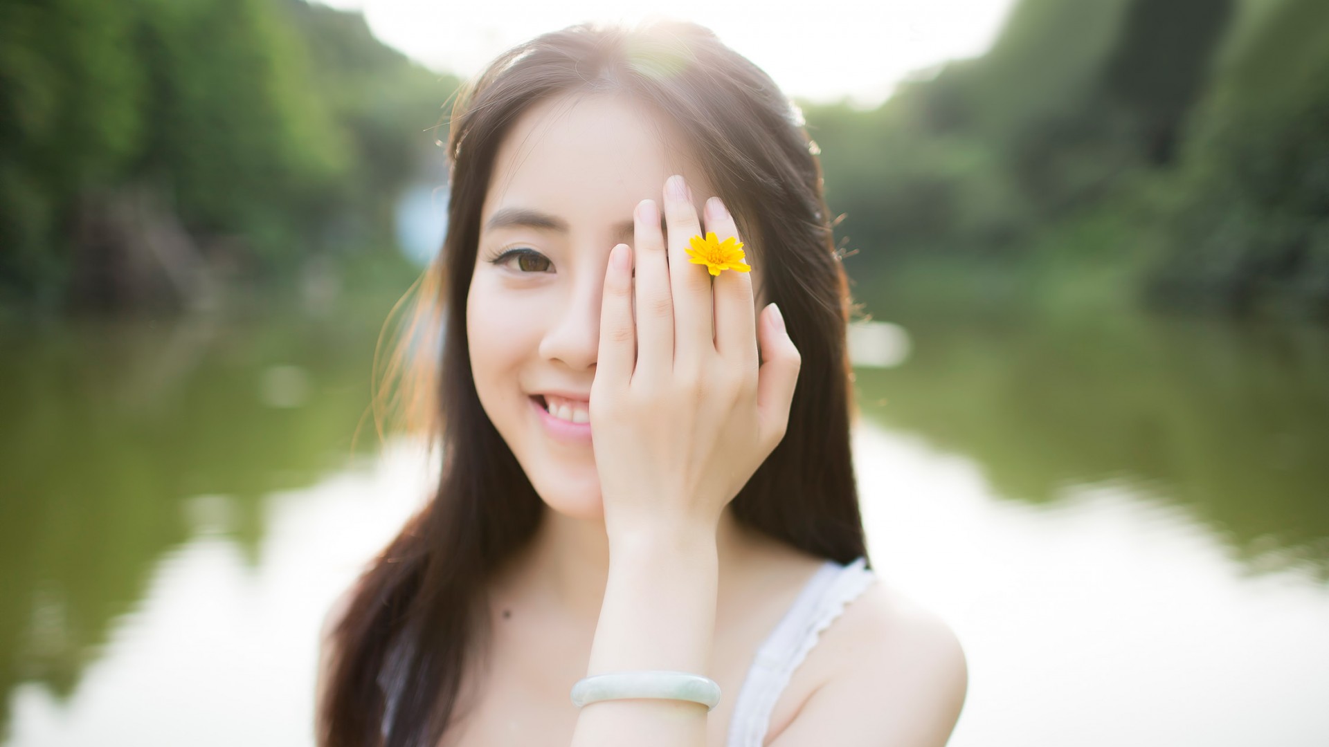 People 1920x1080 women photography model Asian brunette smiling covered face backlighting lens flare hand on face