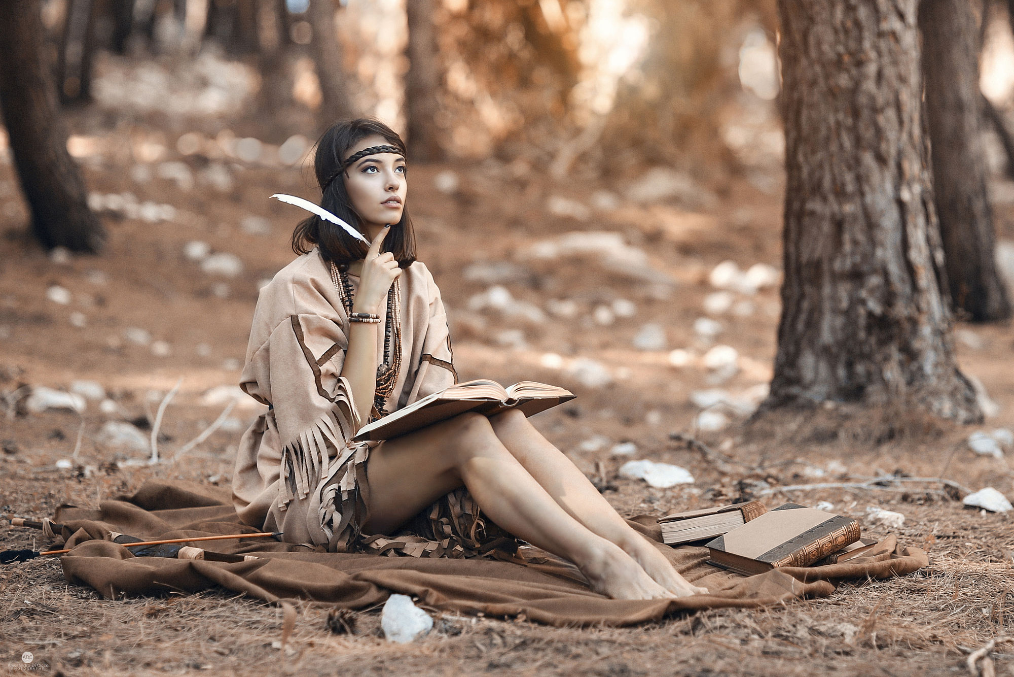 People 2000x1334 Alessandro Di Cicco dark hair hairband Native American clothing feathers books writing pencils nature trees forest bracelets brunette barefoot women outdoors women
