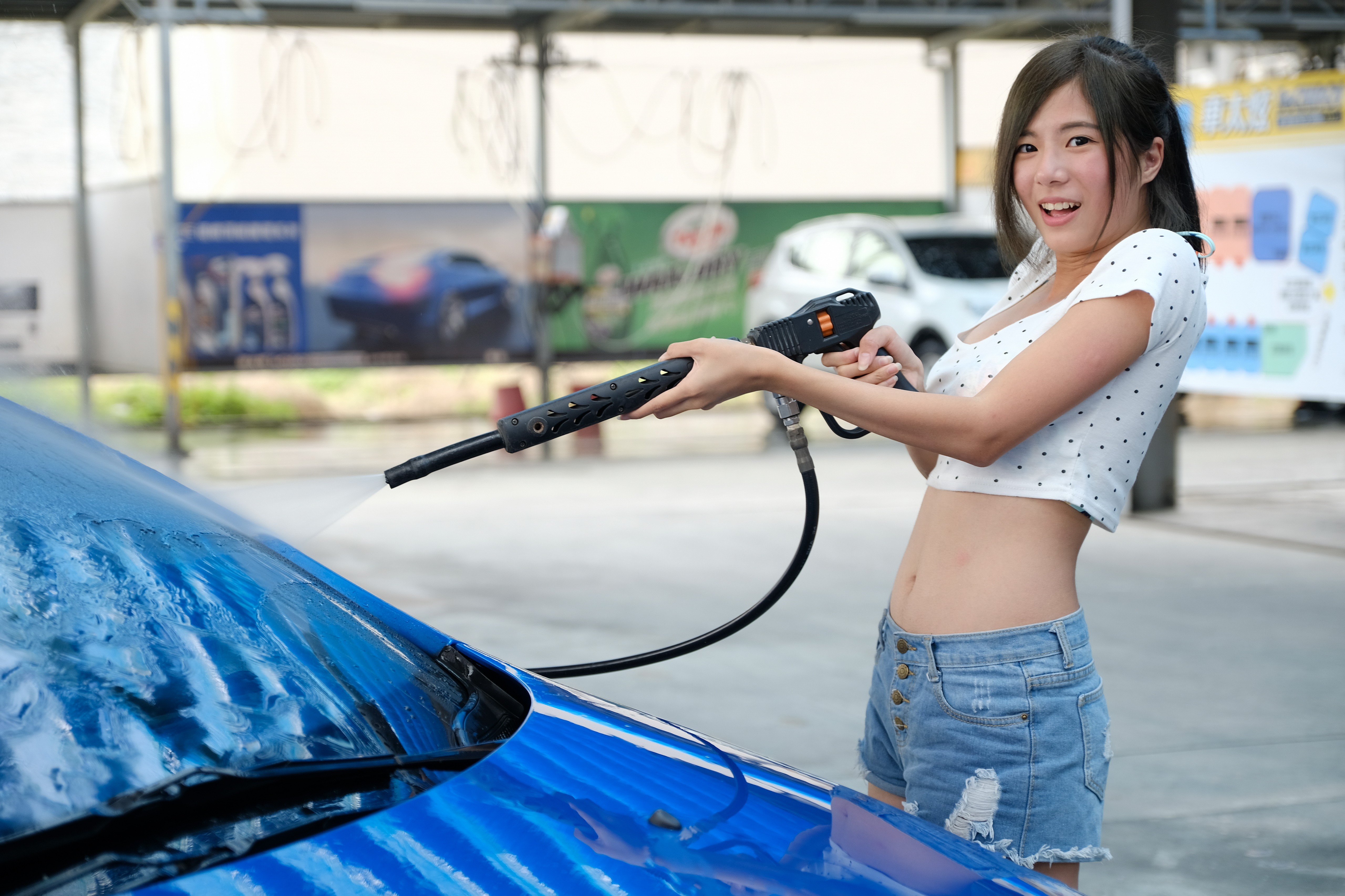 People 5120x3413 Asian car washes blue cars looking at viewer women women outdoors urban car vehicle women with cars belly bare midriff white tops open mouth slim body jean shorts brunette dark eyes model standing