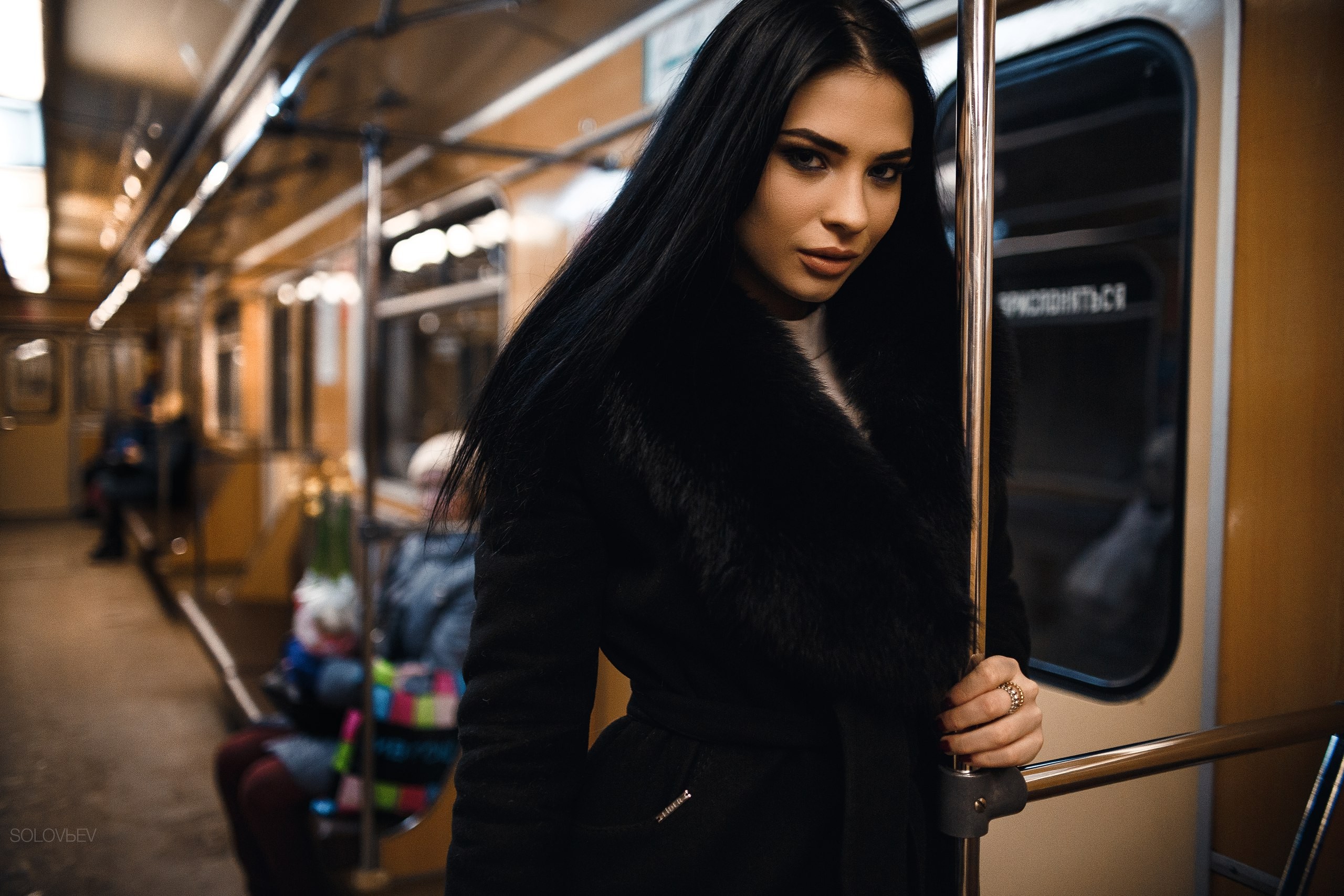 People 2560x1707 Viktoria Efremycheva women portrait depth of field black hair black coat coats Artem SolovЬev model overcoats subway