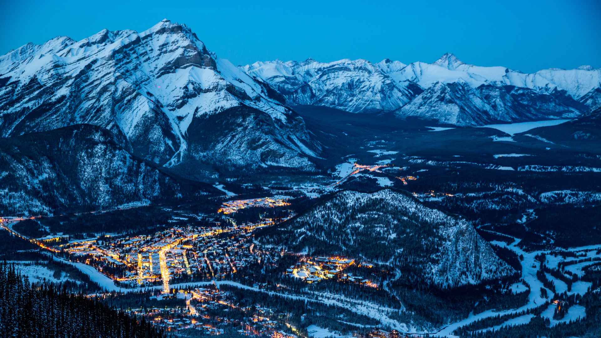 General 1920x1080 nature landscape mountains Canada Banff Banff National Park winter pine trees snow forest lights valley village Tunnel Mountain cyan blue city lights summit