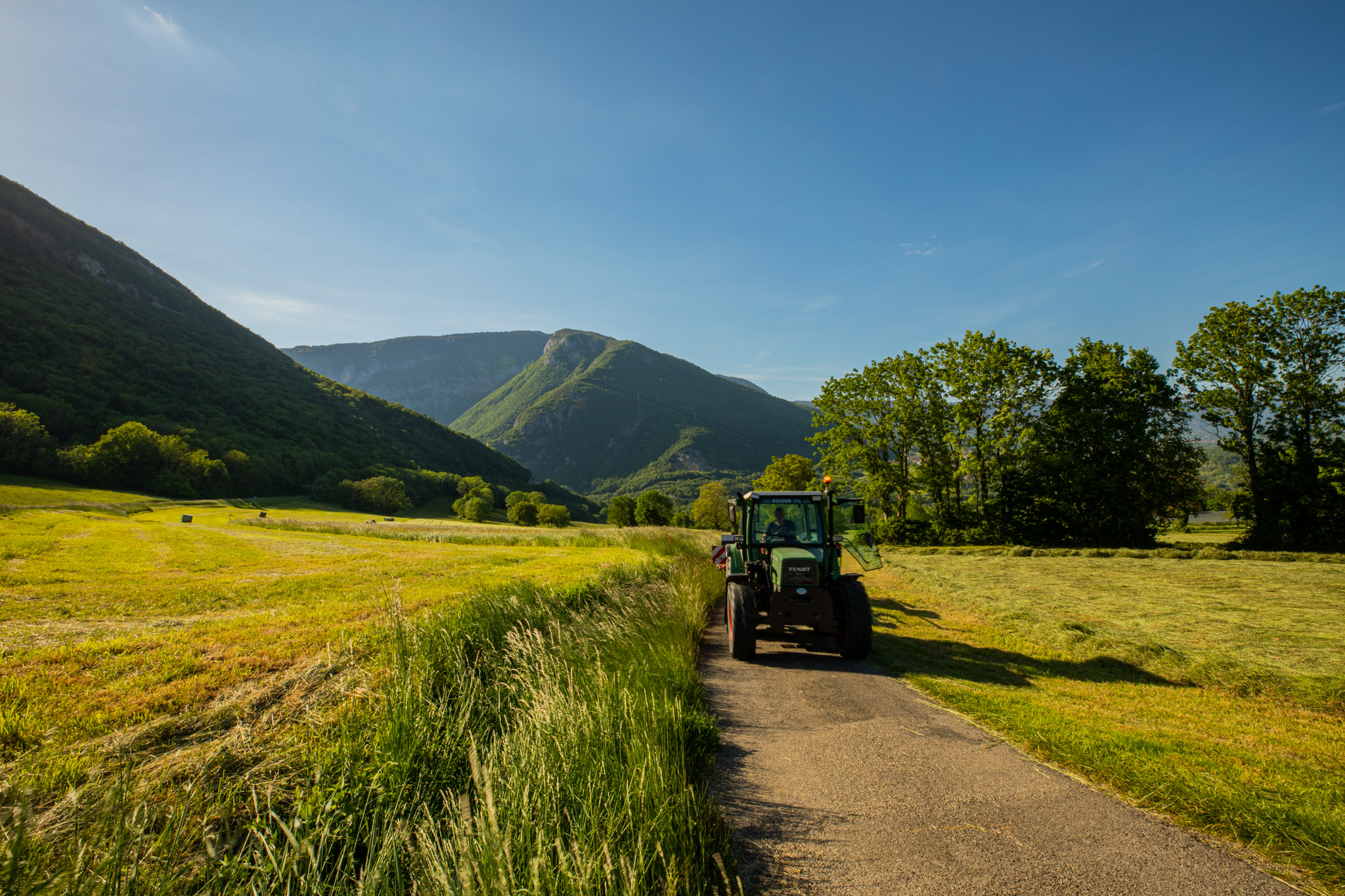 General 2048x1365 photography outdoors trees greenery nature grass field farm tractors mountains road landscape path