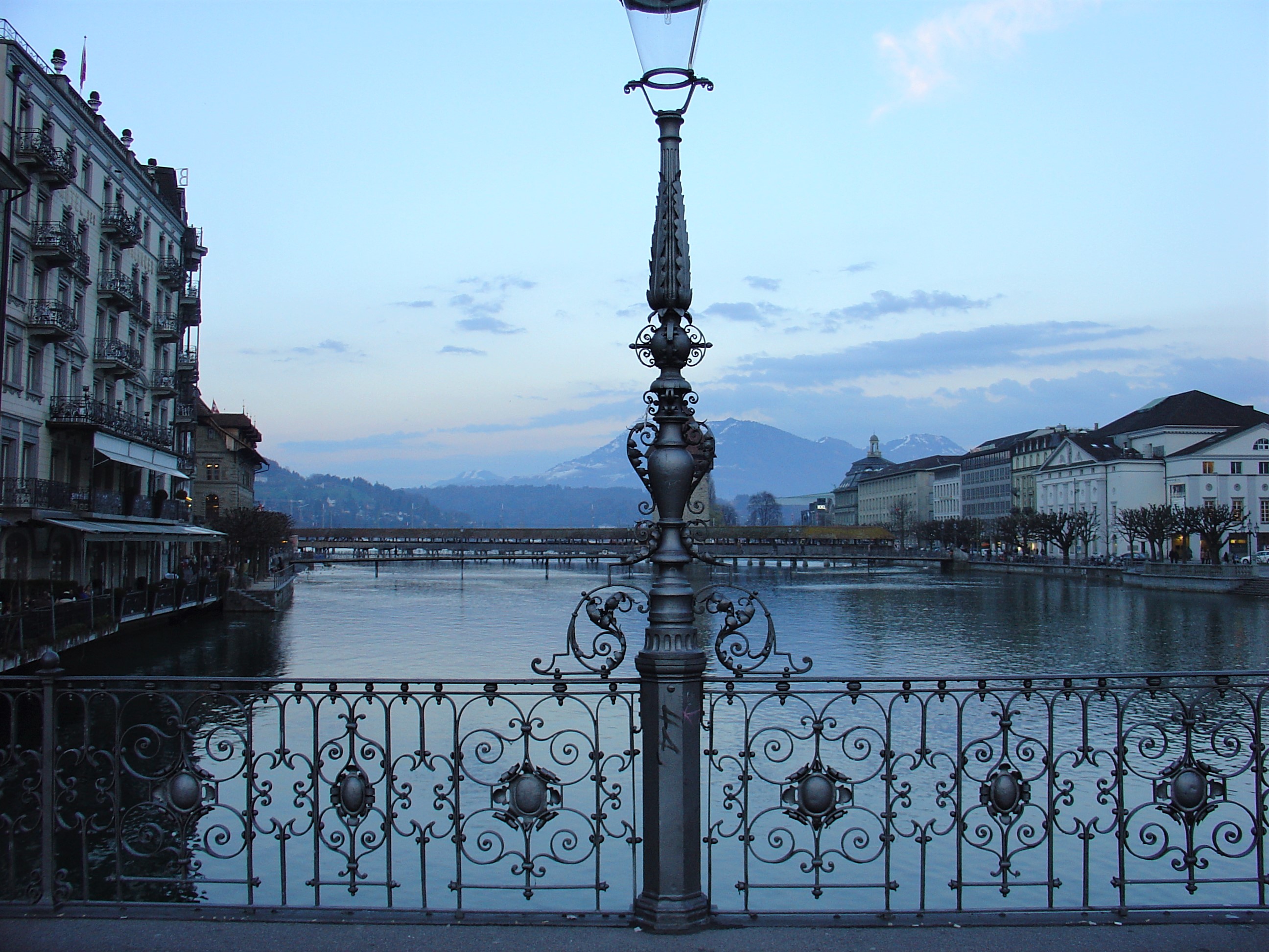 General 2592x1944 city river city town Lucerne sky water reflection building handrail Switzerland river clouds