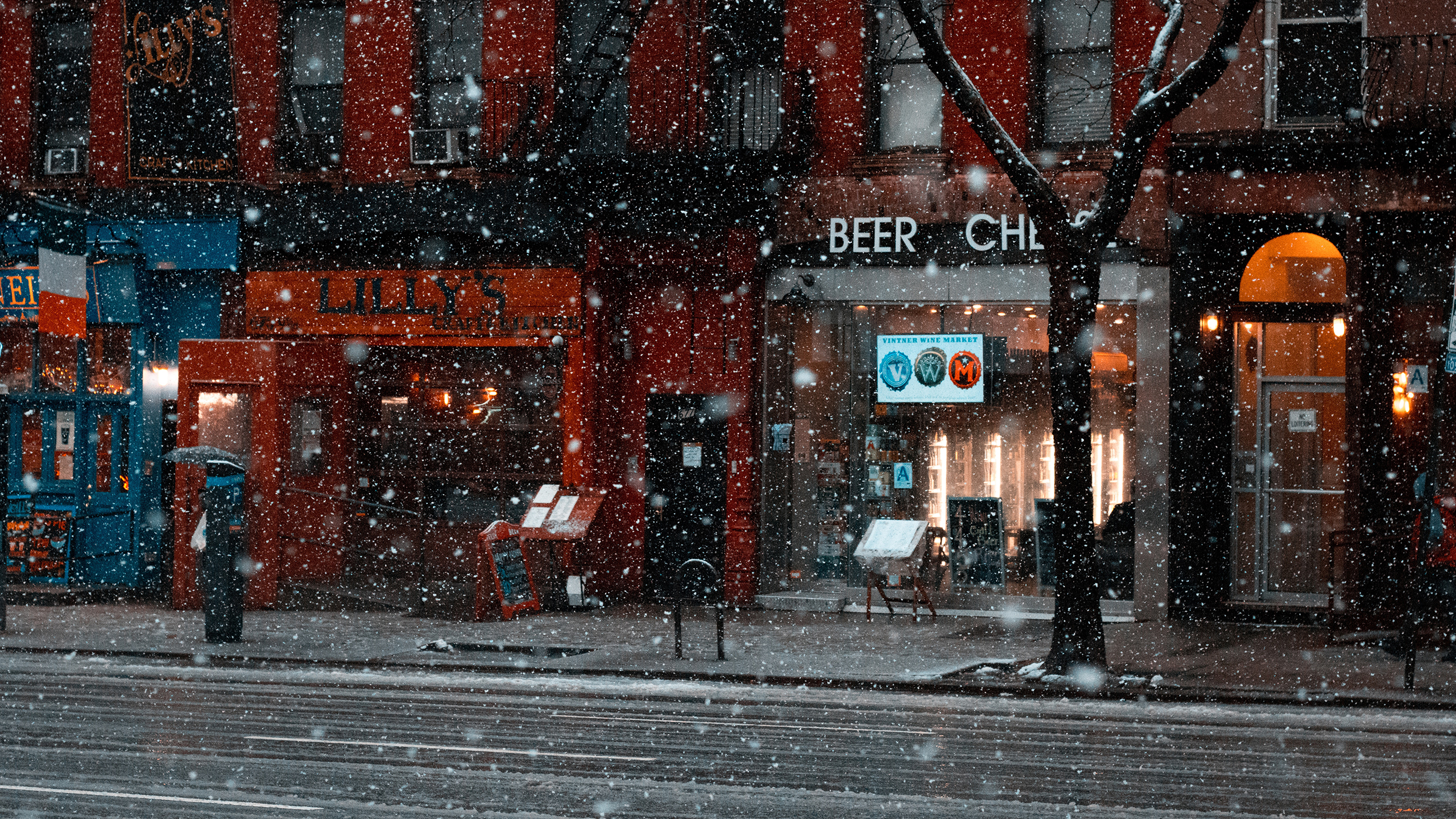 General 2560x1440 street stores urban snowing New York City Manhattan