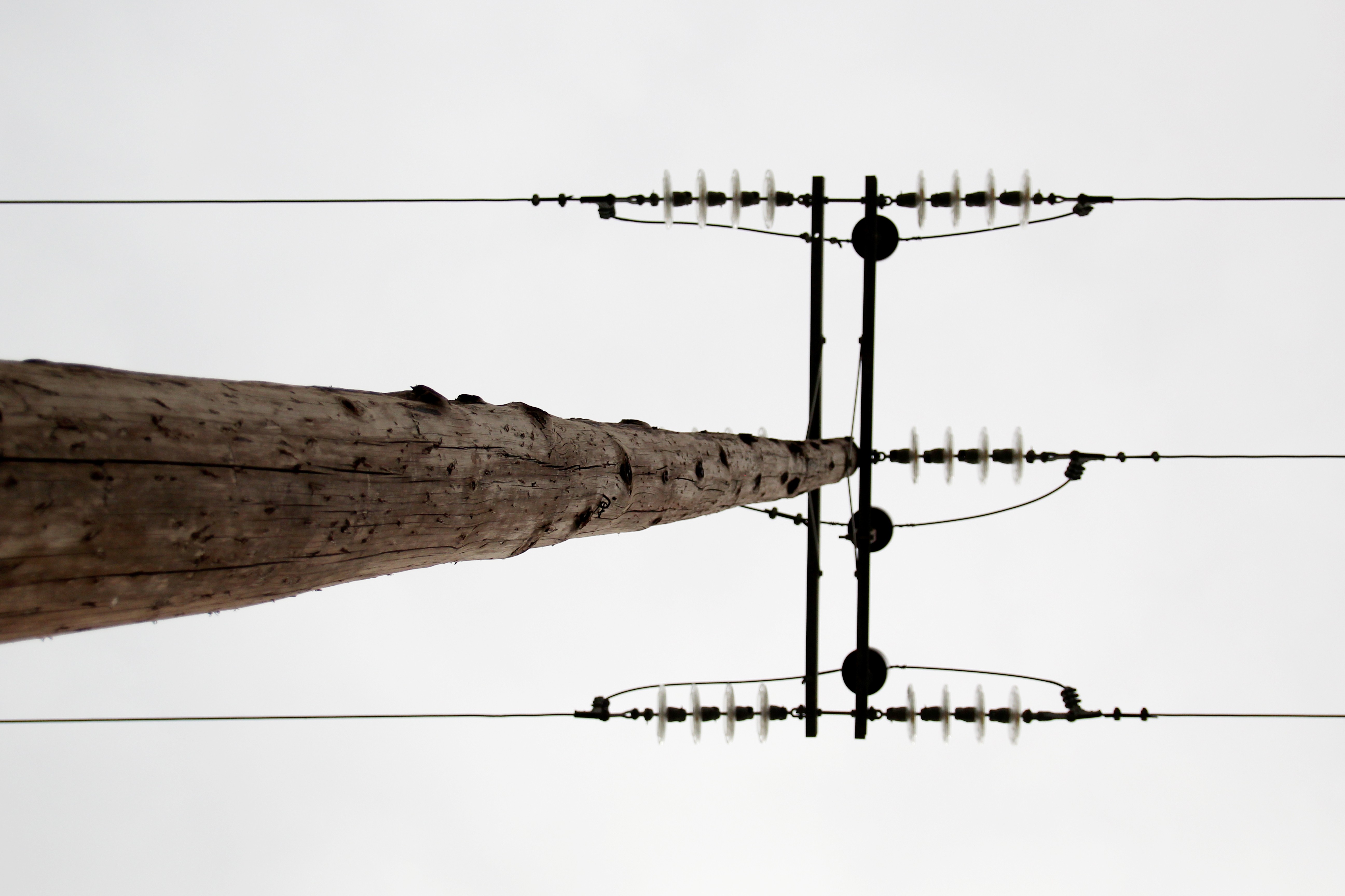 General 5184x3456 power lines worm's eye view overcast simple background wood utility pole bottom view pylon