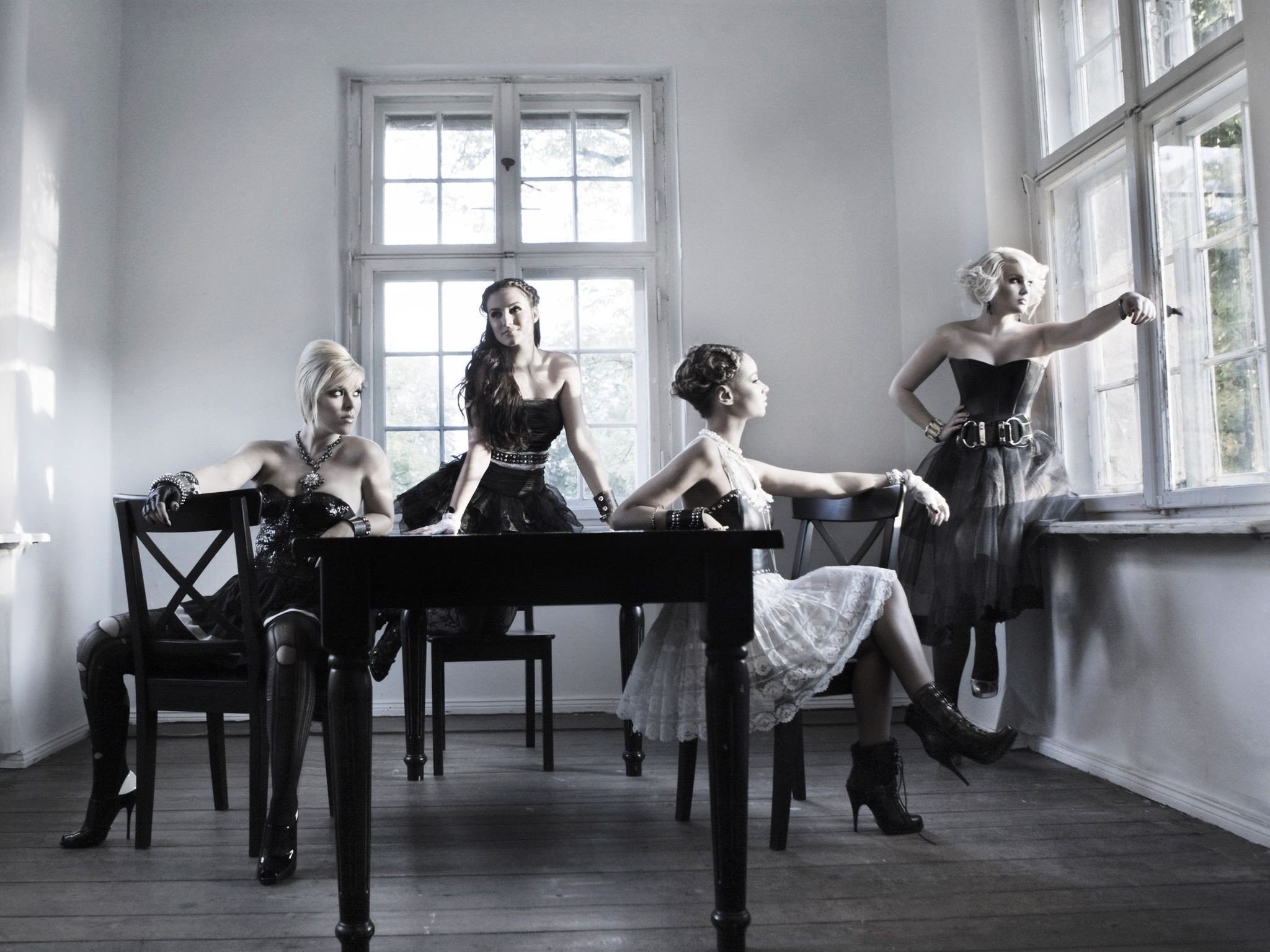 People 2048x1536 women table chair women quartet window dress sitting group of women model women indoors leaning room heels necklace legs