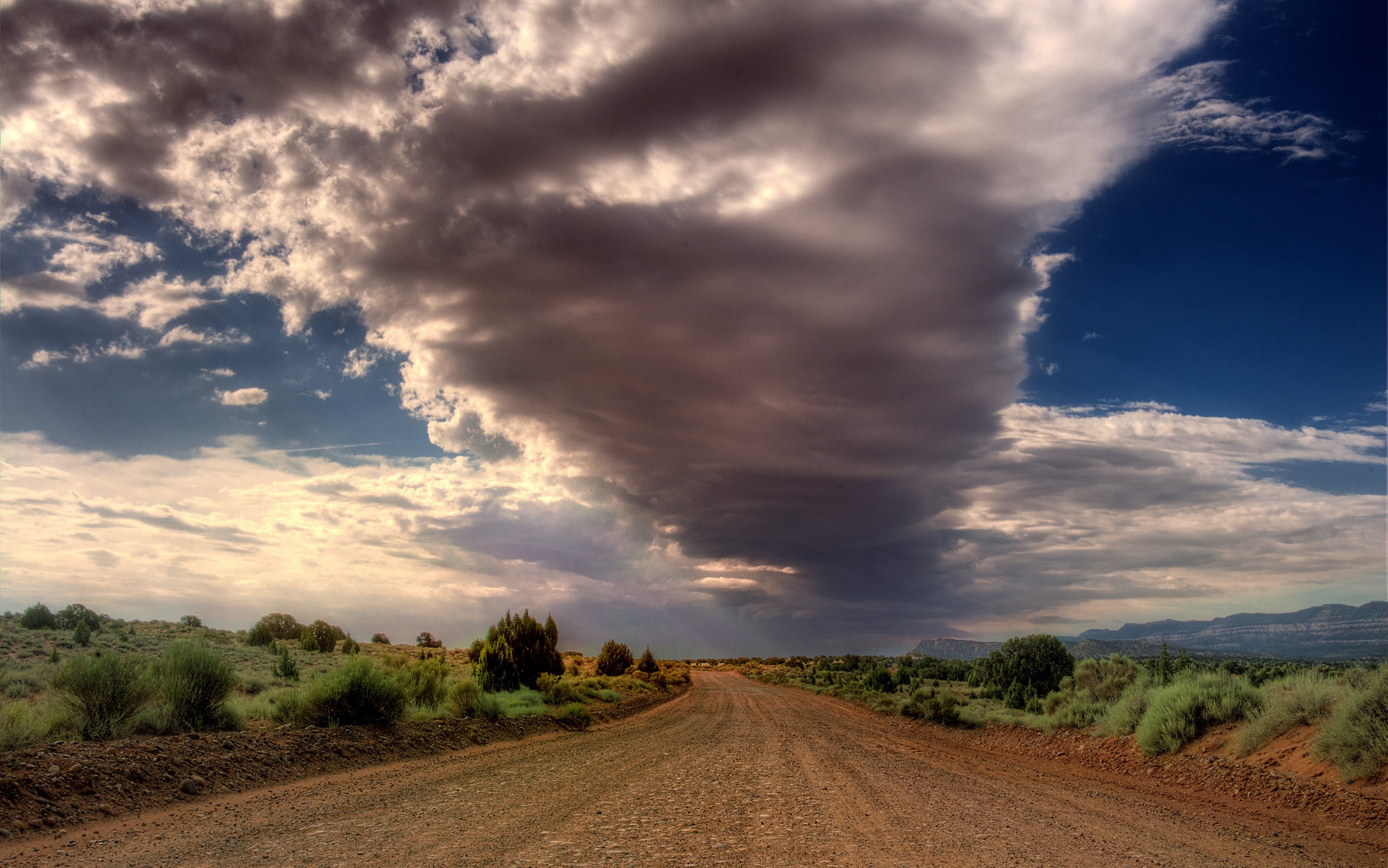 General 2560x1600 landscape dirt road clouds plains dirt shrubs Badlands (nature) sky road nature outdoors