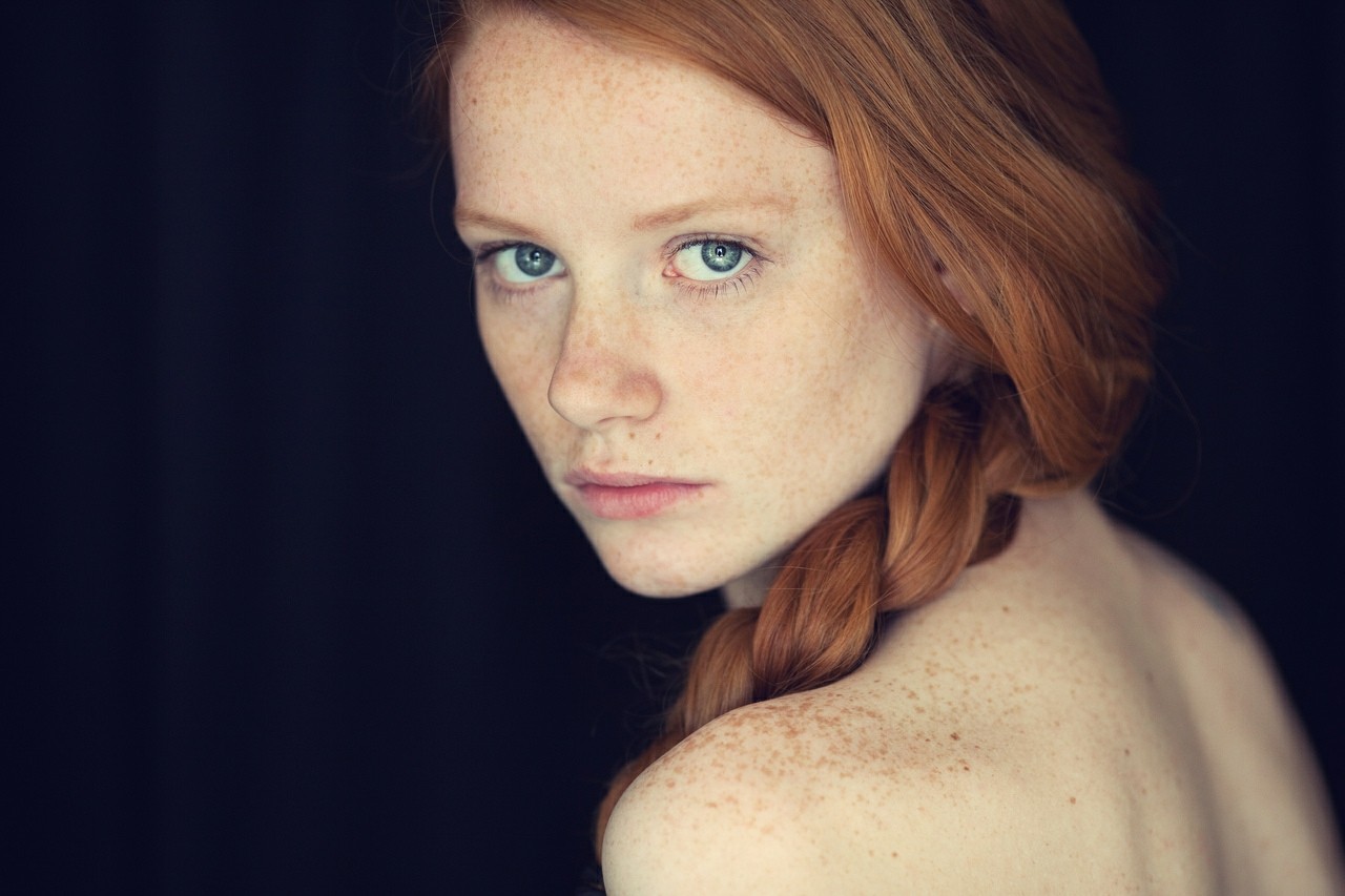 People 1280x853 women model redhead looking at viewer freckles bare shoulders face portrait blue eyes braids simple background women indoors indoors studio blue background