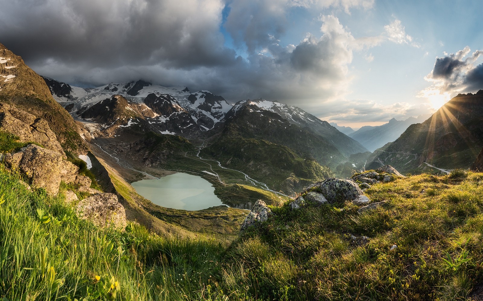 General 1600x1000 nature landscape sunset mountains sun rays lake grass snowy peak clouds Alps Switzerland