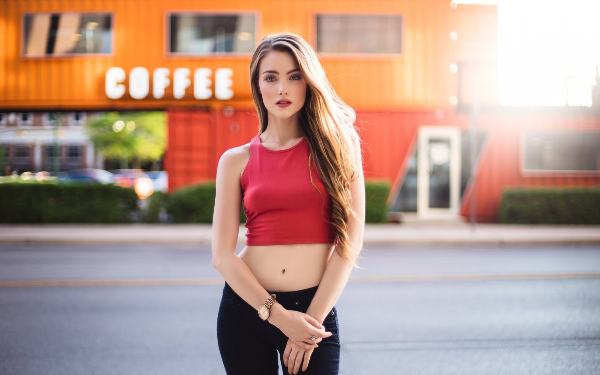 People 1920x1200 women April Slough blonde blue eyes red tops looking at viewer depth of field crop top black pants long hair standing public open mouth straight hair red lipstick tank top no bra glare women outdoors urban 500px wristwatch Robert Stebler casual overexposed