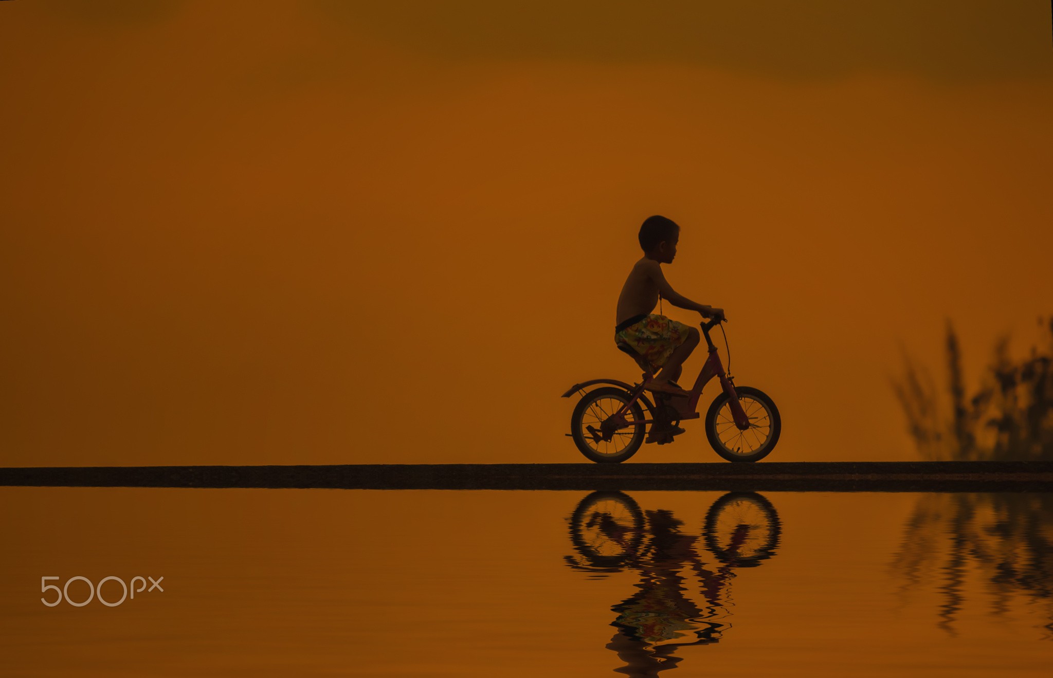 General 2048x1319 children 500px bicycle reflection low light watermarked