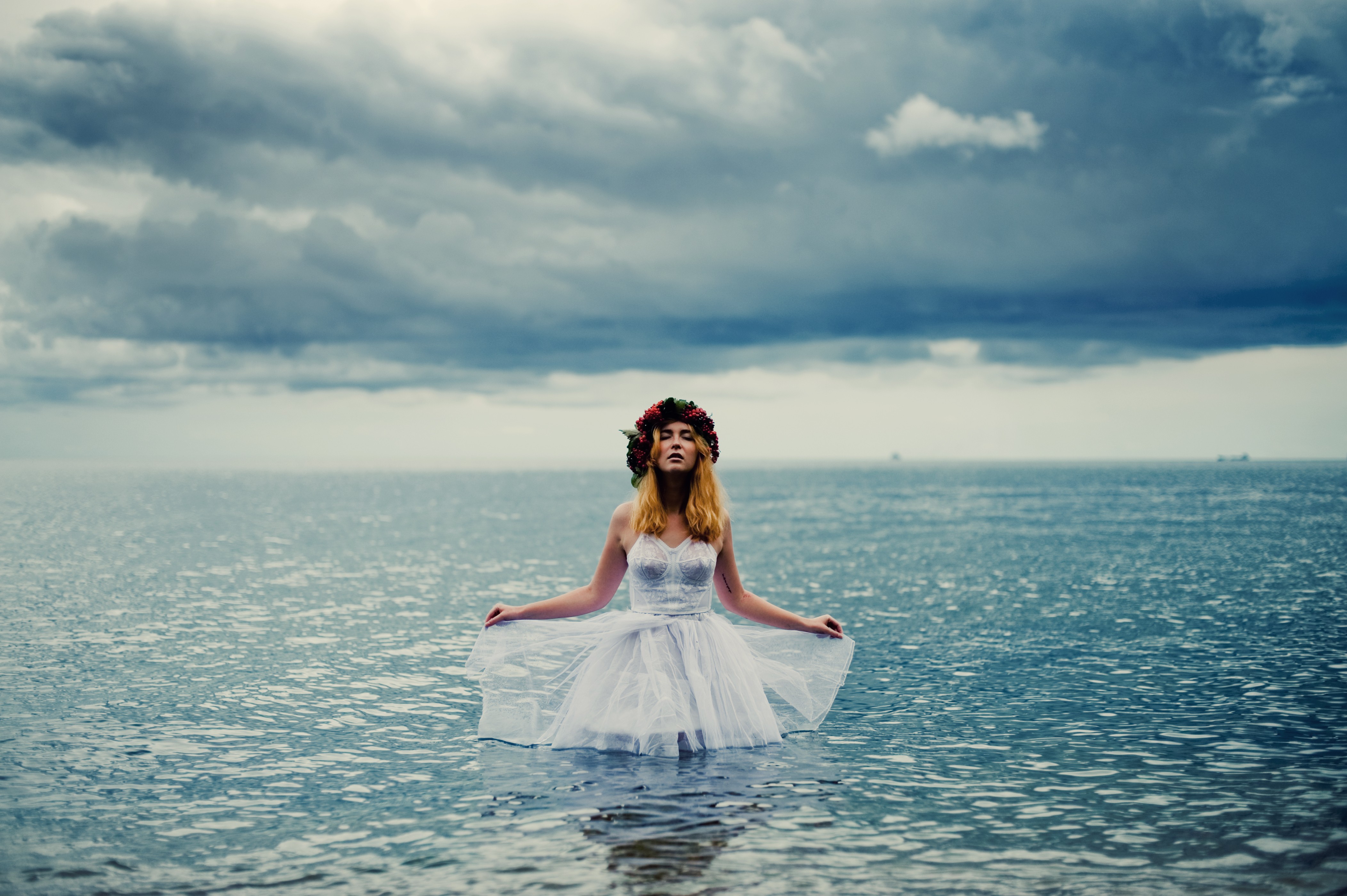 People 4208x2800 women model sea clouds blonde white dress outdoors flower in hair tattoo frontal view closed eyes in water sky horizon white clothing standing women outdoors