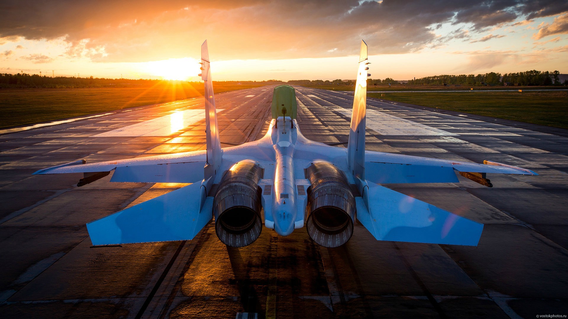 General 1920x1080 military military aircraft jet fighter Sukhoi sunlight vehicle military vehicle aircraft Russian/Soviet aircraft J-16 sunset sunset glow watermarked rear view sky clouds Sun