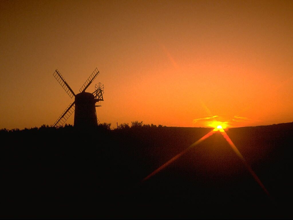 General 1024x768 sunset landscape sun rays silhouette windmill dark sunlight