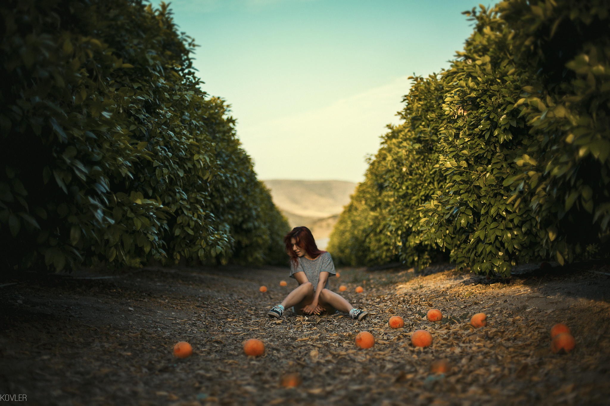 People 2048x1365 women redhead sitting path orange (fruit) Dan Kovler clear sky women outdoors model