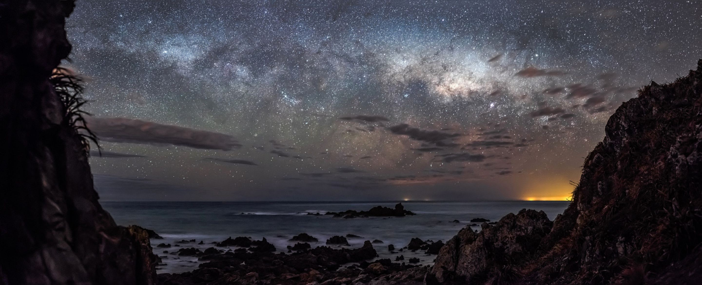 General 2880x1170 stars night landscape starry night sea rocks clouds long exposure galaxy nature coast