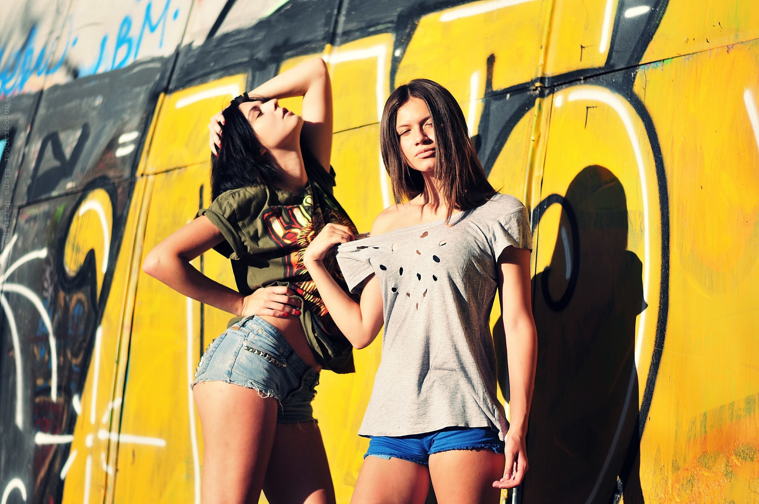 People 2560x1700 women model jean shorts wall graffiti short shorts T-shirt two women standing black hair brunette