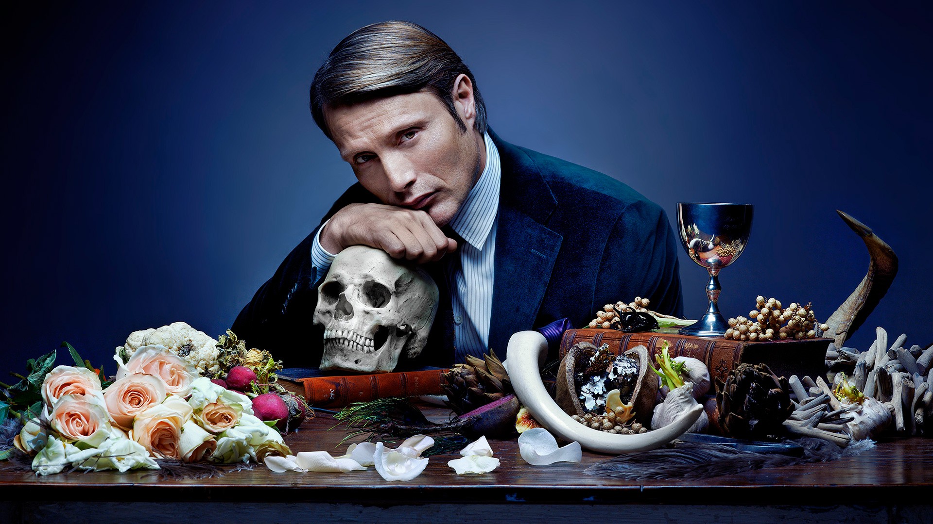 People 1920x1080 Hannibal Hannibal Lecter Mads Mikkelsen TV series skull men food flowers actor looking at viewer blue background gradient