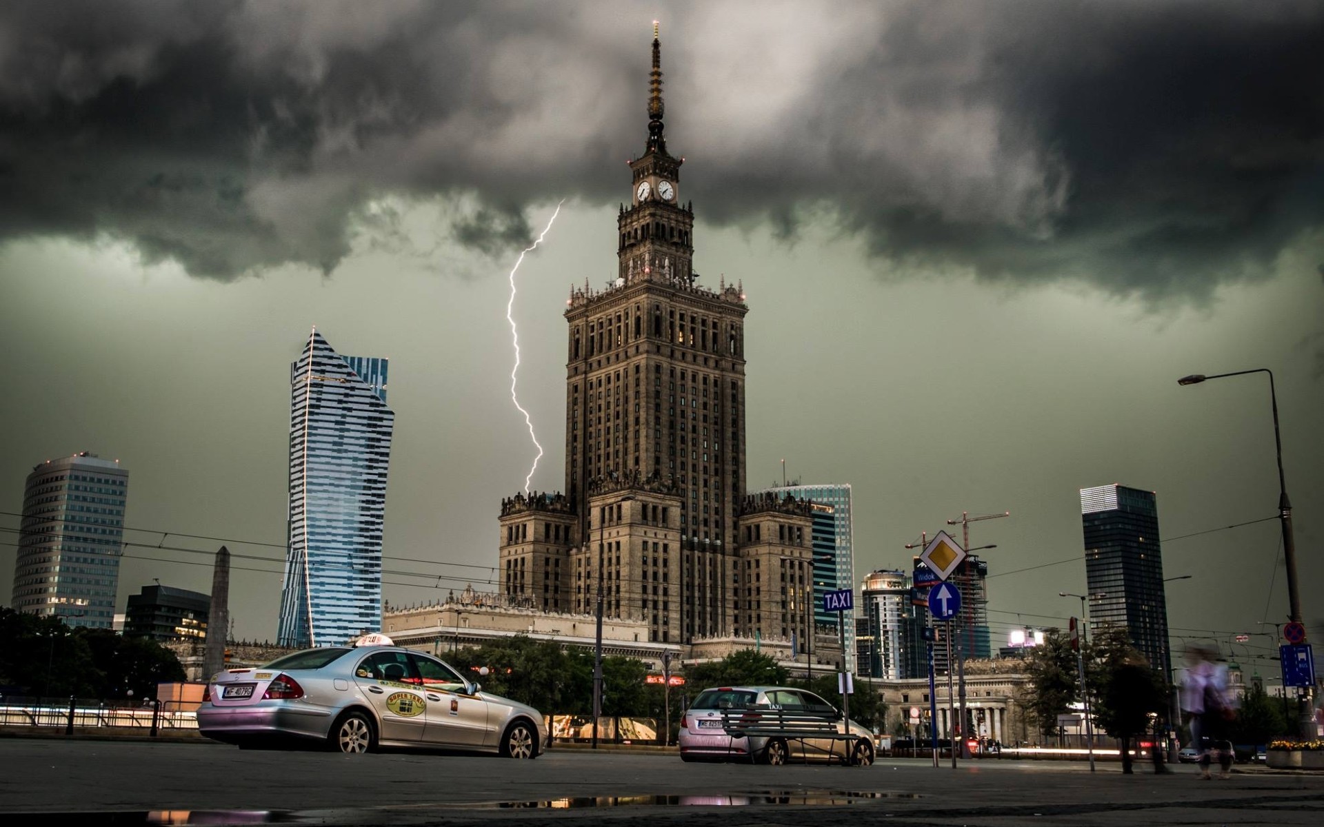 General 1920x1200 city cityscape clouds lightning building architecture car clock tower Warsaw Poland Polish Palace of Culture and Science vehicle sky