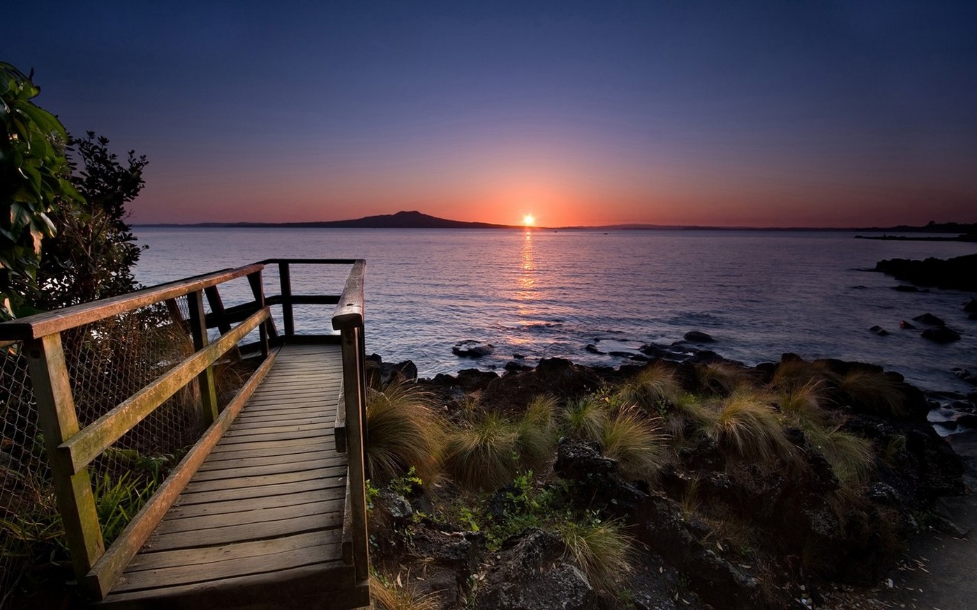 General 1400x875 nature landscape island sunset walkway coast sea New Zealand shrubs water