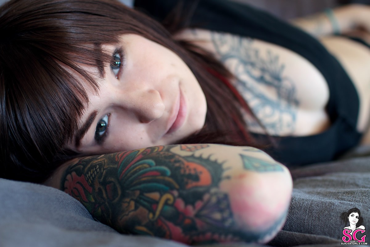 People 1200x800 Suicide Girls tattoo women brunette face inked girls 2011 (Year) lying on side women indoors model