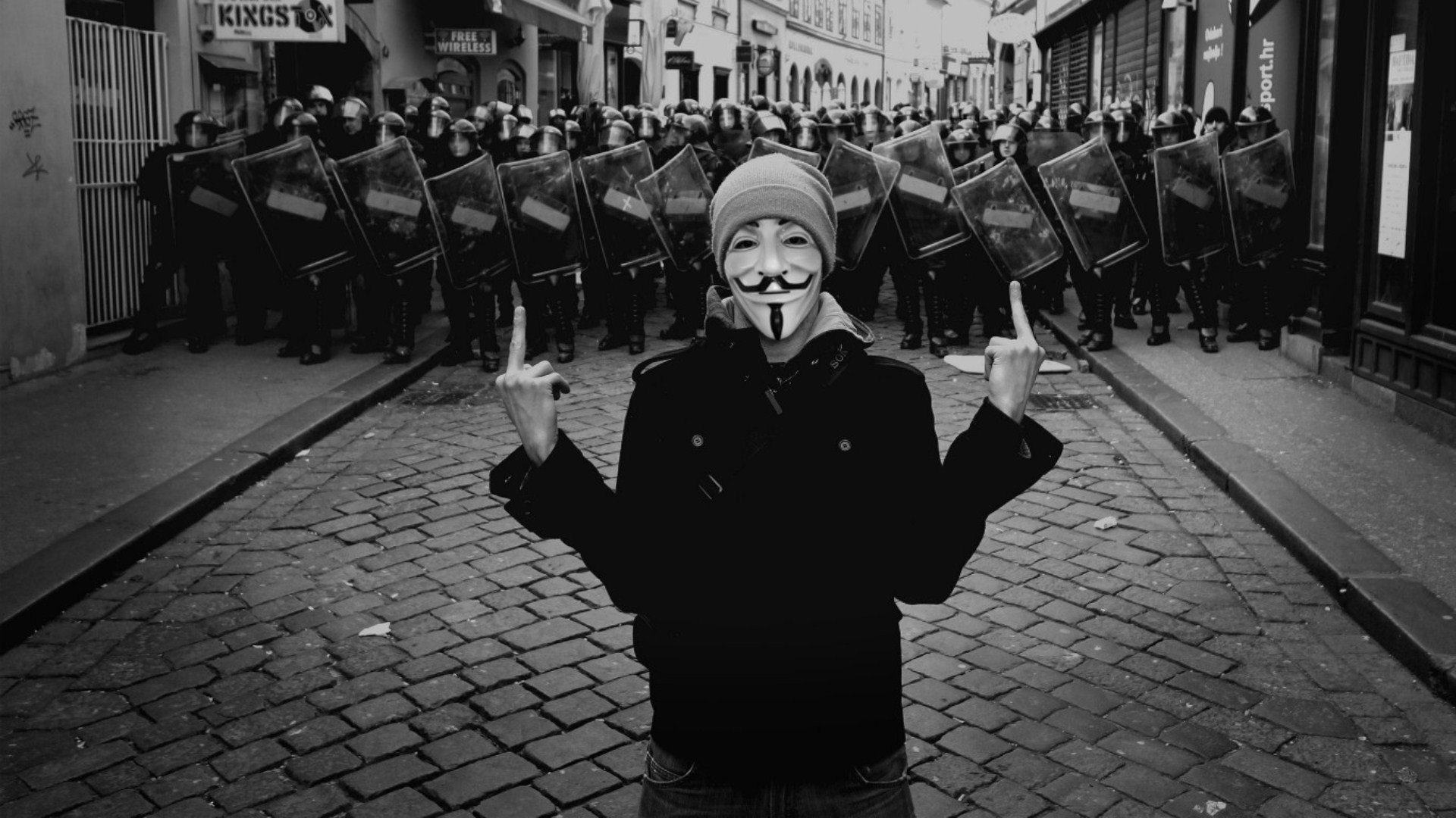 People 1920x1080 Guy Fawkes mask Anonymous (hacker group) pavements police shield middle finger monochrome mask city urban street