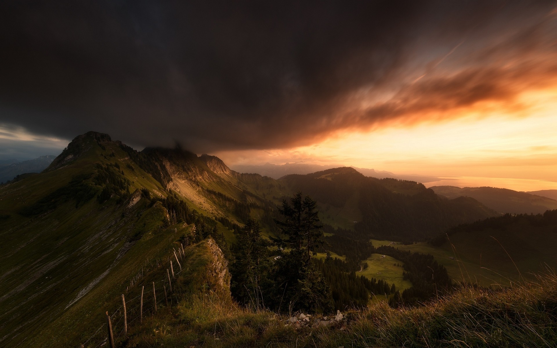 General 1920x1200 landscape nature mountains valley sunset clouds sky fence trees grass Switzerland low light