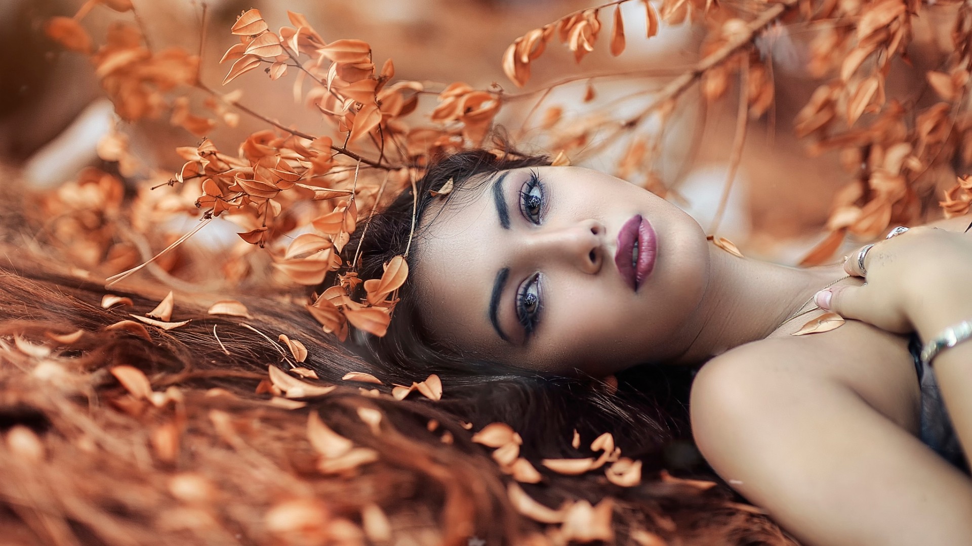 People 1920x1080 women model brunette long hair looking at viewer women outdoors face portrait bare shoulders nature makeup lying on back leaves fall depth of field Alessandro Di Cicco sensual gaze closeup