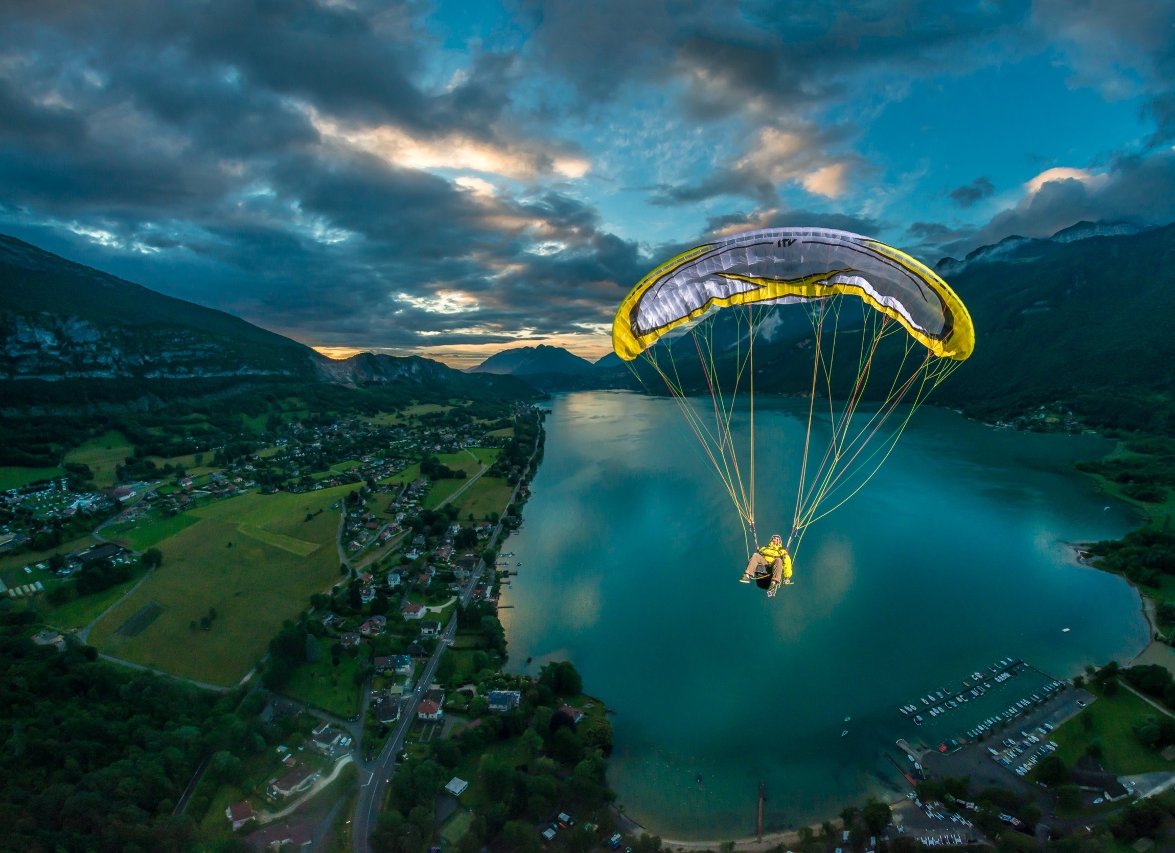 General 2299x1669 nature landscape flying paragliding lake mountains field sunset clouds France